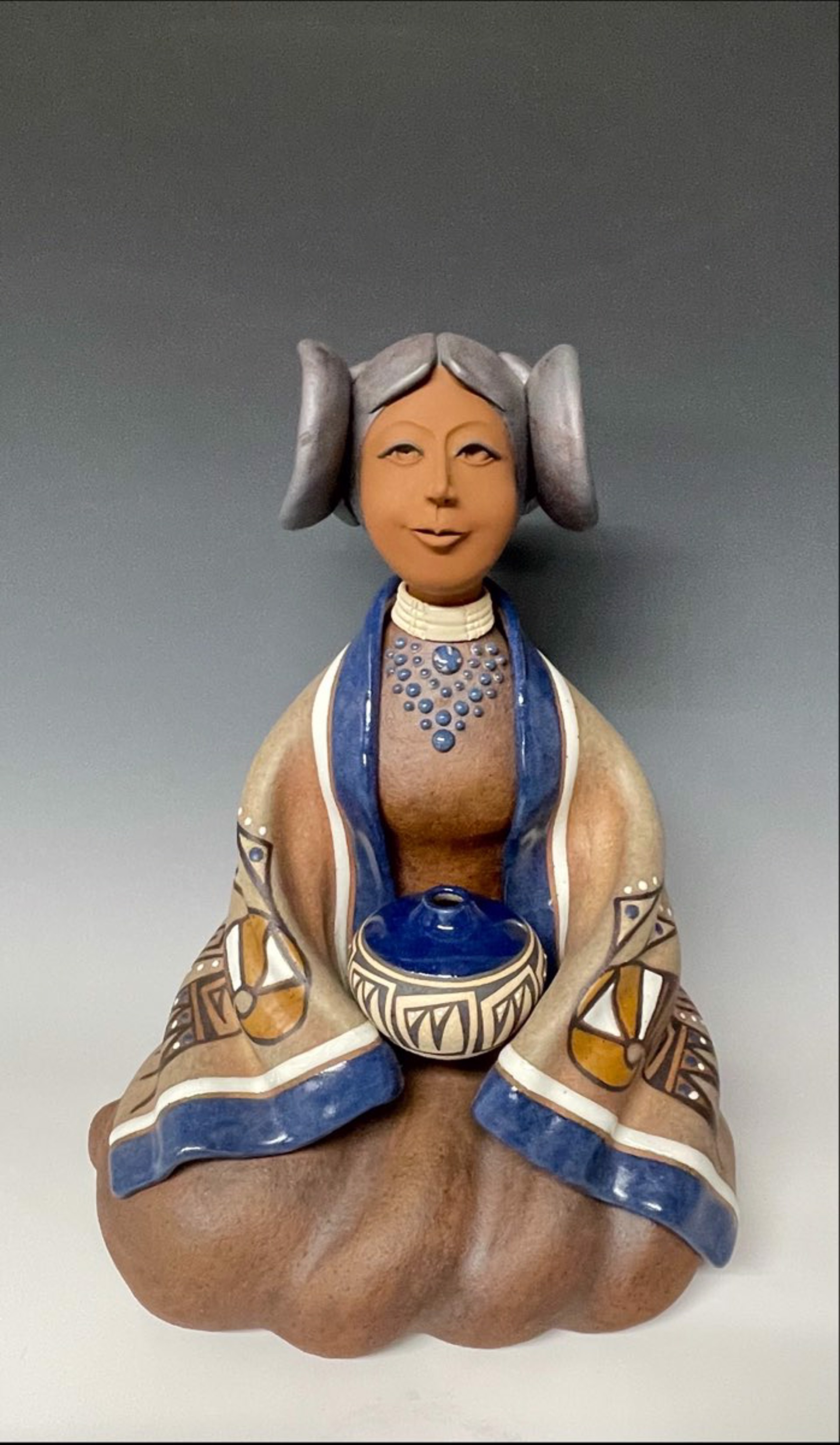 Hopi Maiden Seated Blue by Terry Slonaker