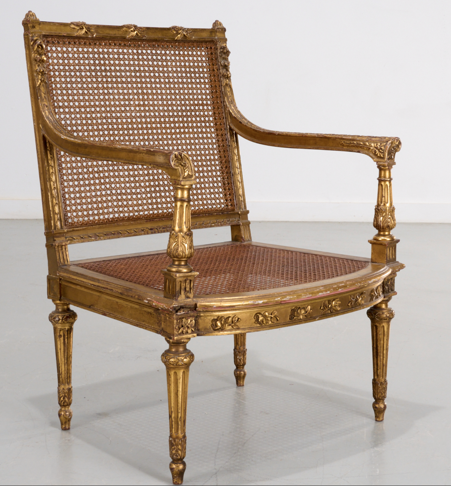 NAPOLEON III GILTWOOD FAUTEUIL WITH CANED SEAT AND BACK
