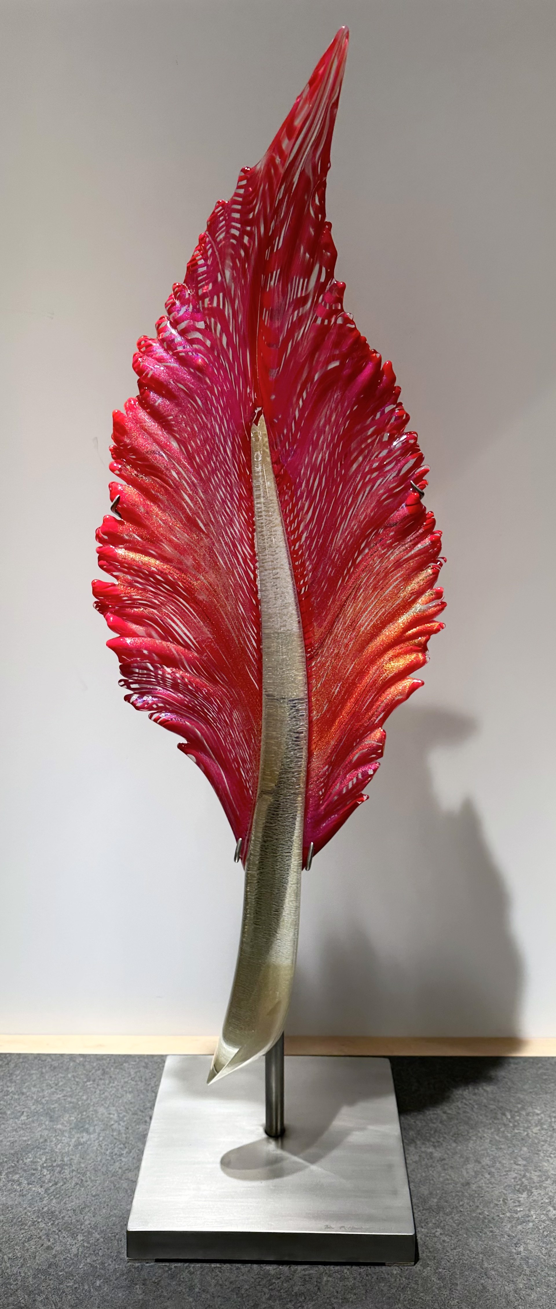 Vertical Red Feather by Nic McGuire