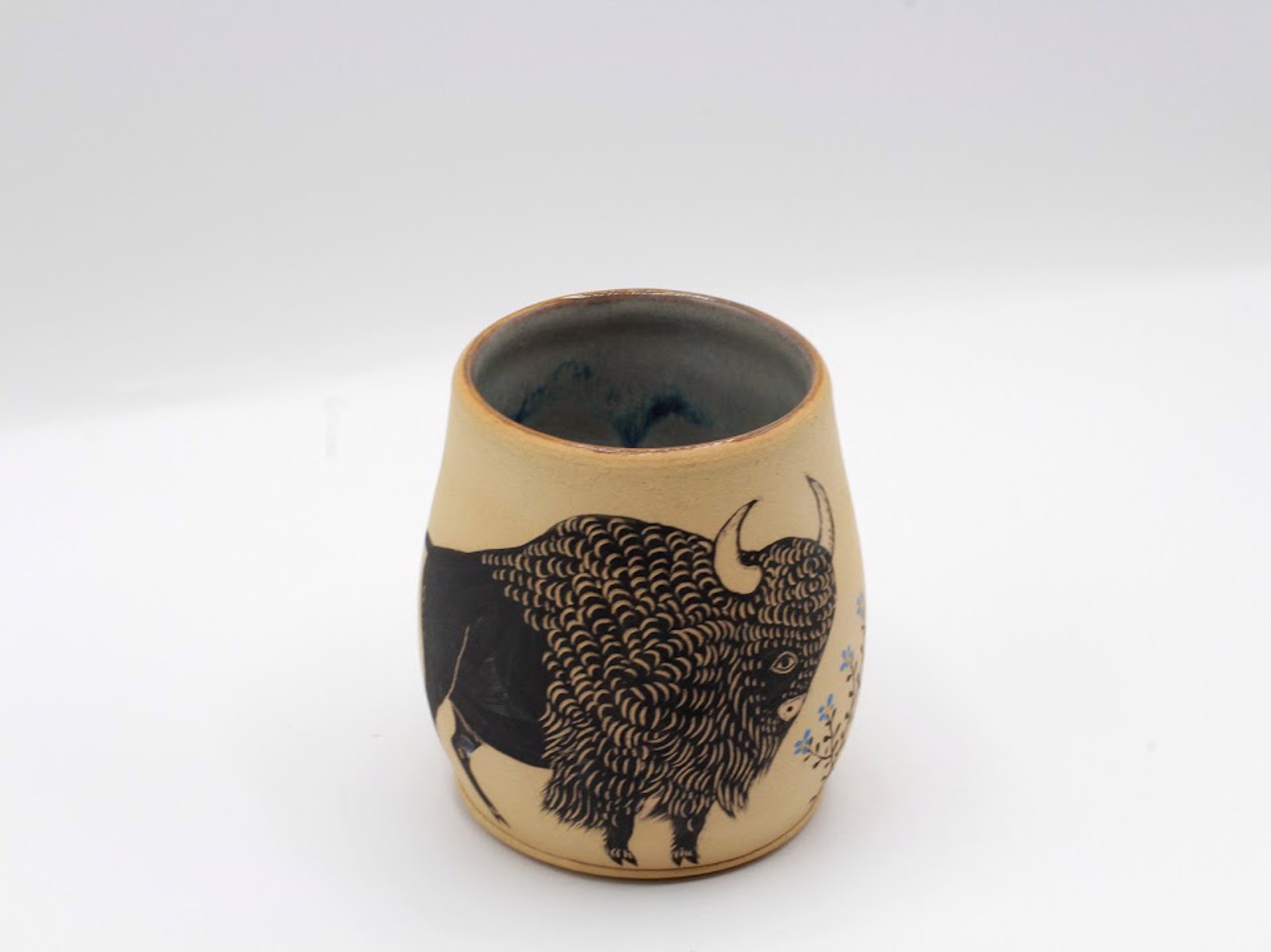Buffalo with Flowers Mug by Christine Sutton