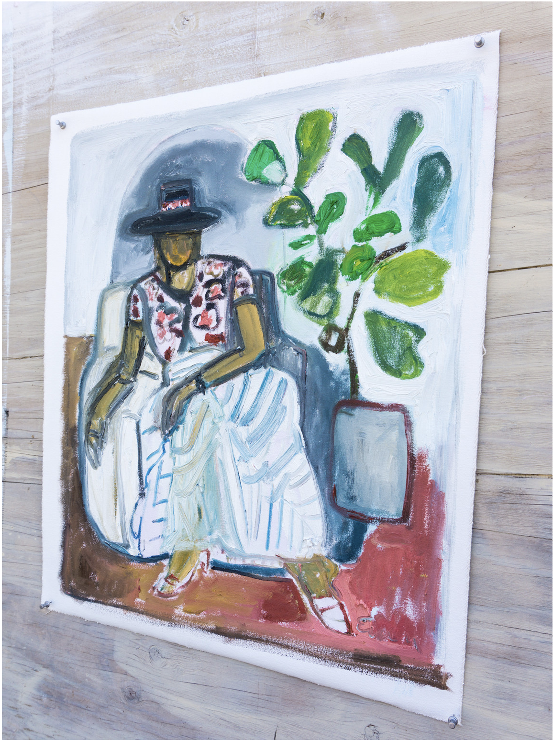 Signora in hat with Fiddle Leaf Fig by Anne-Louise Ewen