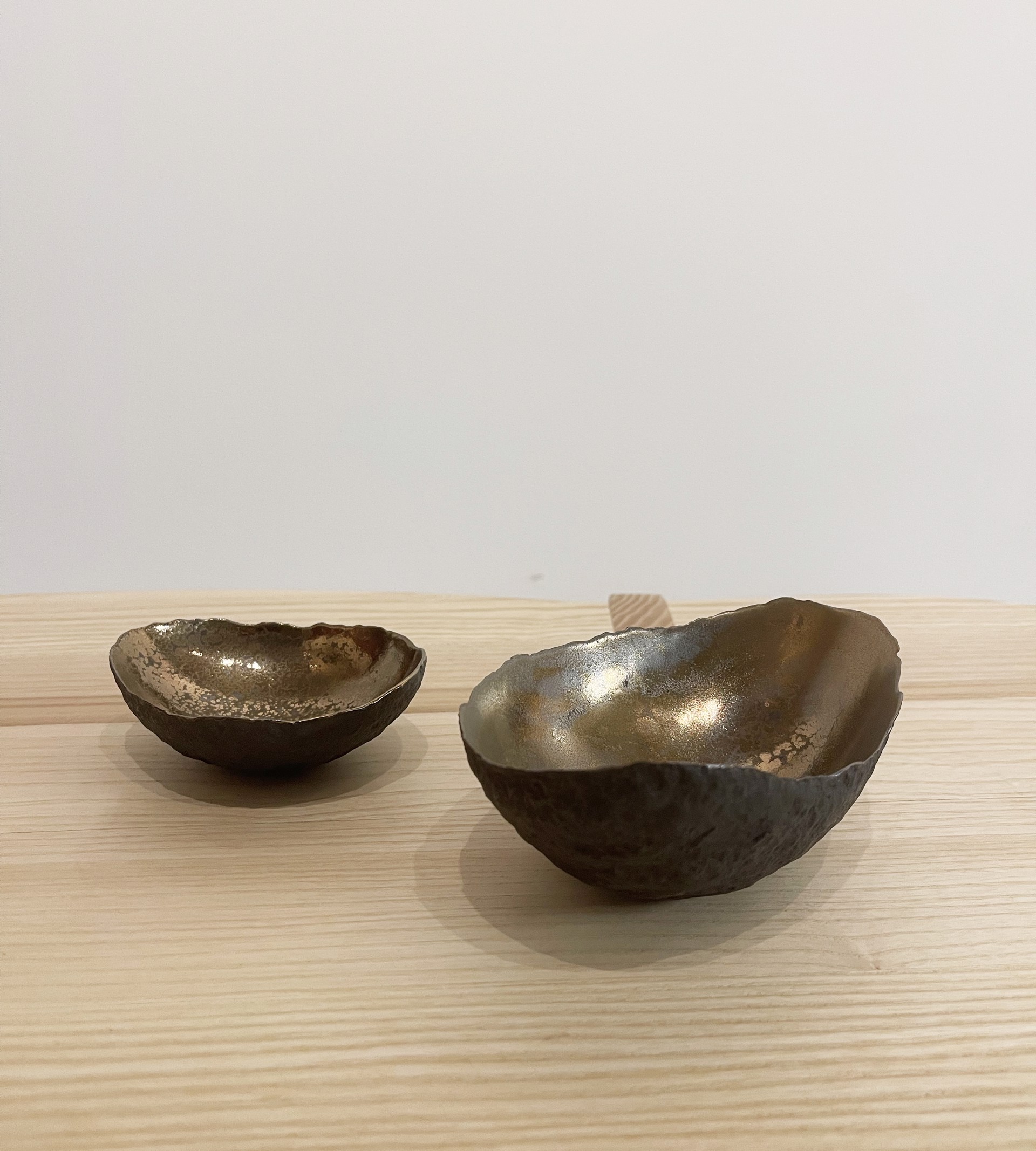 Small vessel with textured bronze glaze by Cristina Salusti