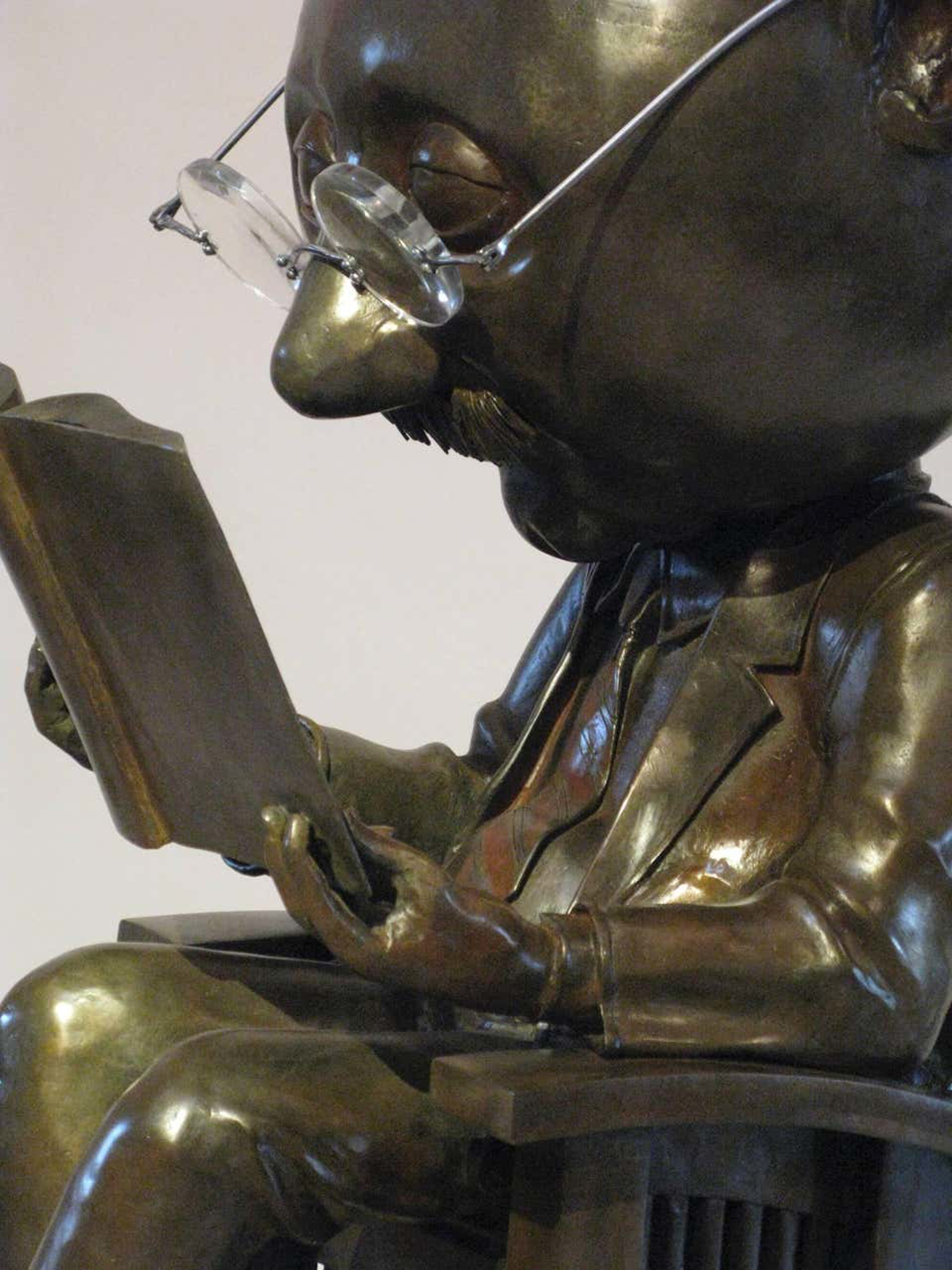 The Reader, bronze edition 12 by Rodger Jacobsen