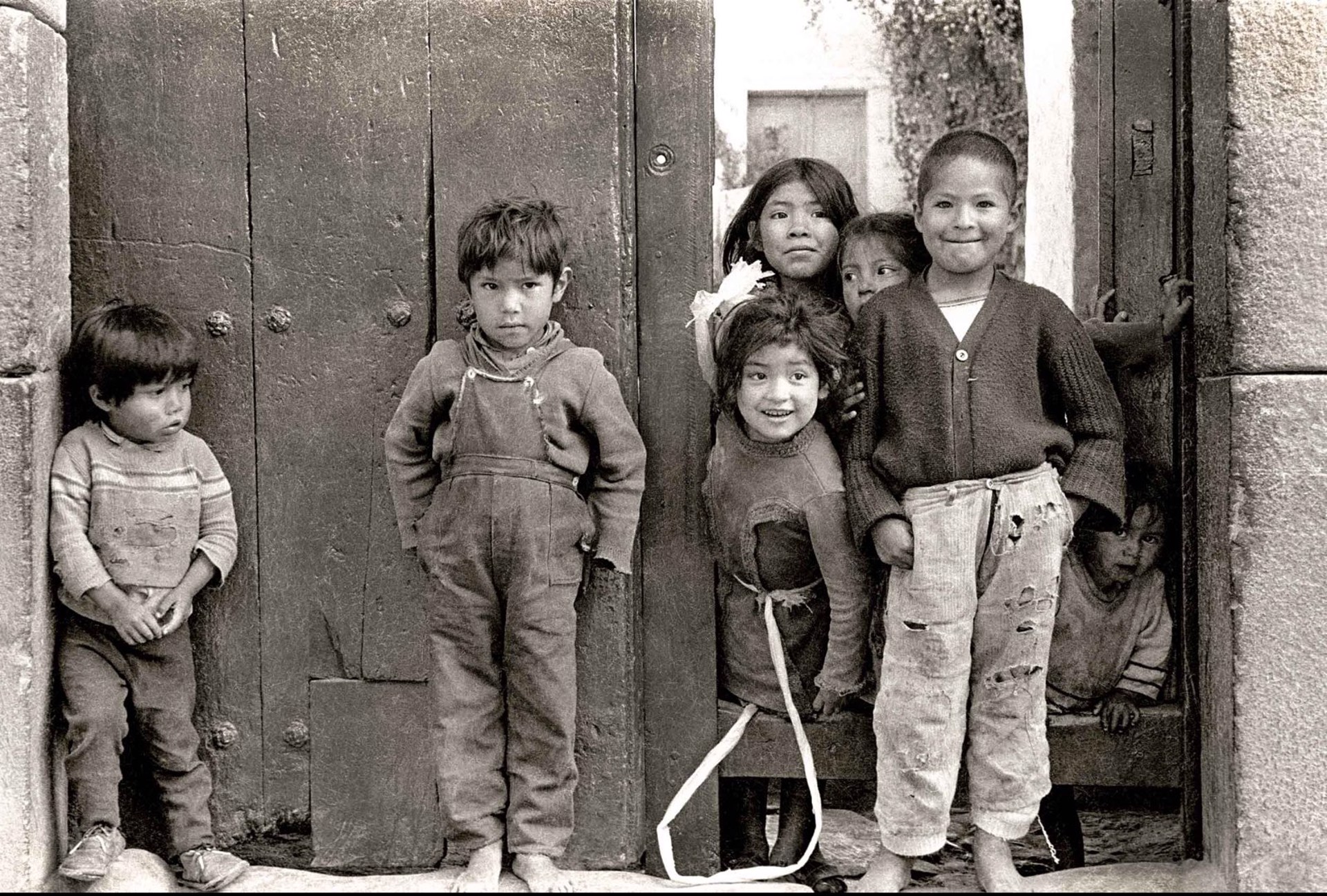 Seven Kids in Doorway, Framed (114) by Jack Dempsey