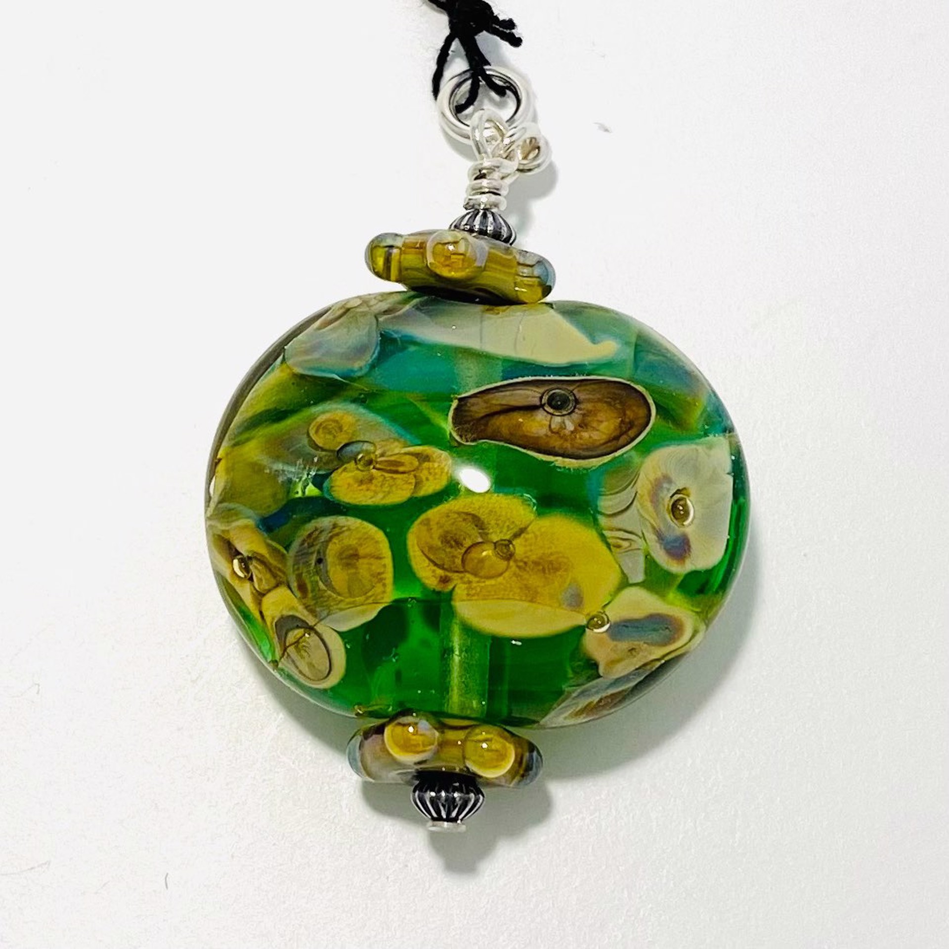 Green Eclipse, Raku Encased Charm LS22-87 by Linda Sacra