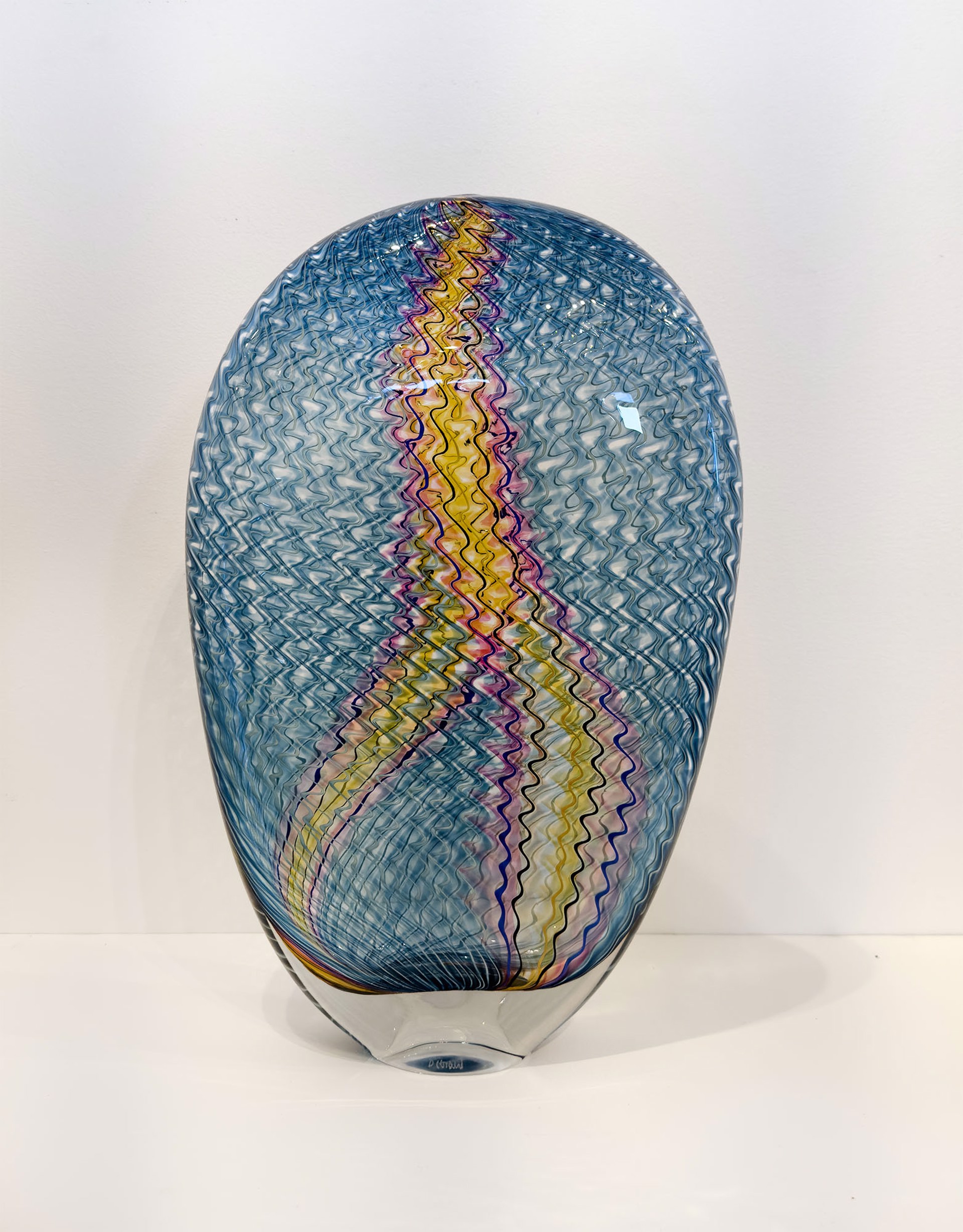 Original Hand Blown Glass Sculpture By Dan Friday Featuring A Rounded Vessel With Blue Pink And Yellow Lightning Pattern Motifs