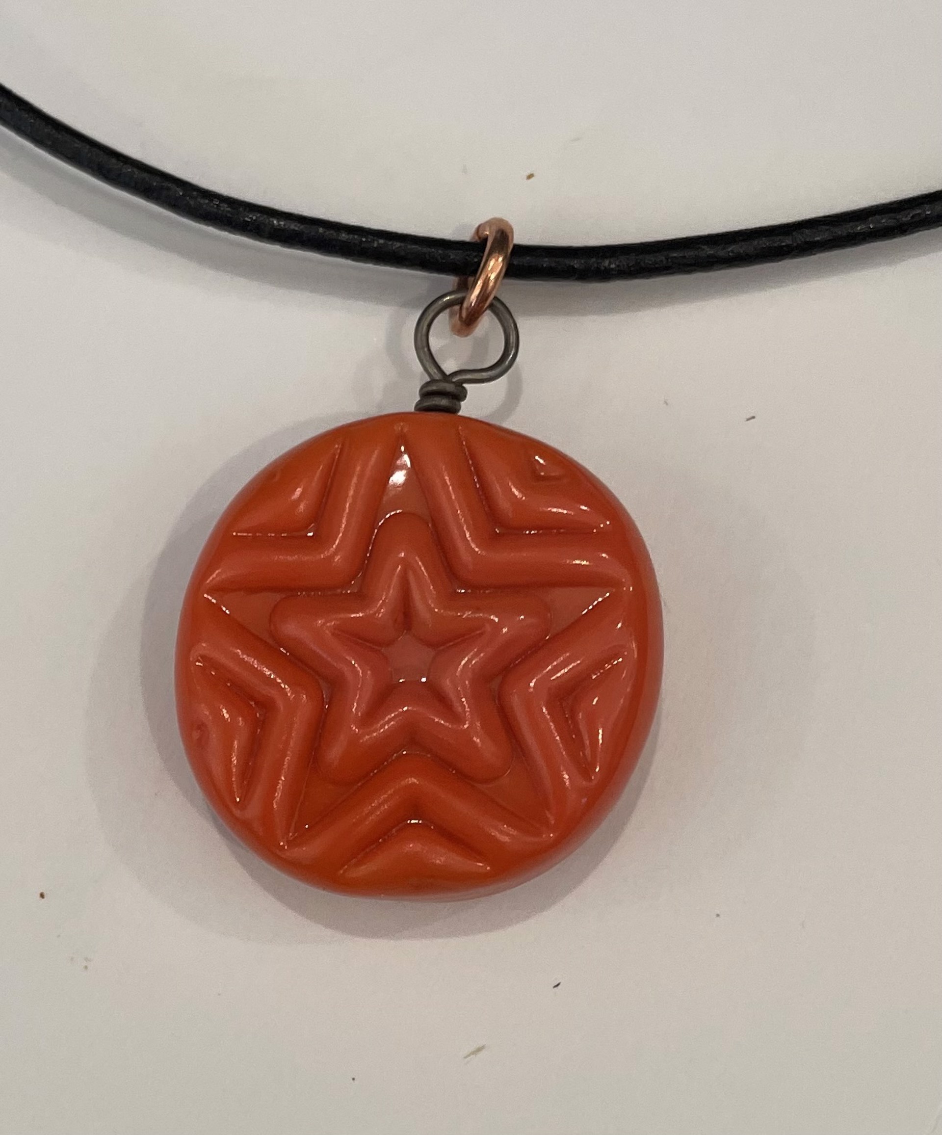 Orange Star Stamp Necklace by Emelie Hebert
