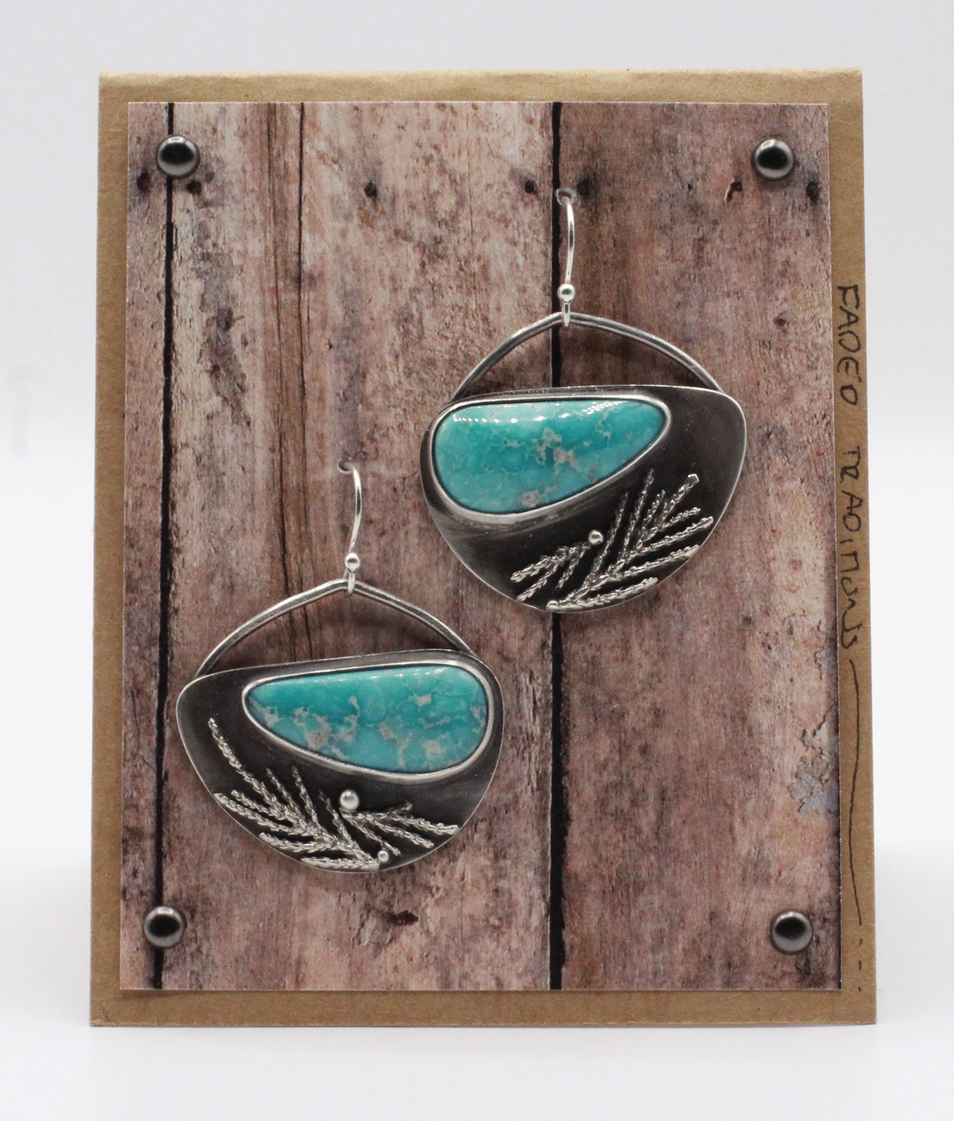 Whitewater Turquoise Shields with Juniper Castings by Ashley Hanna
