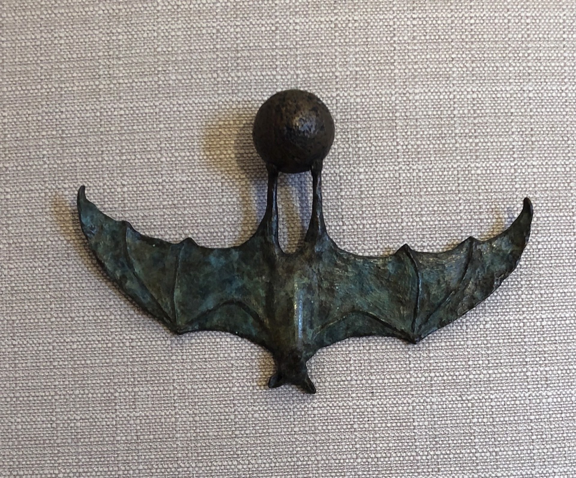 Bat on a Ball, green patina by Copper Tritscheller