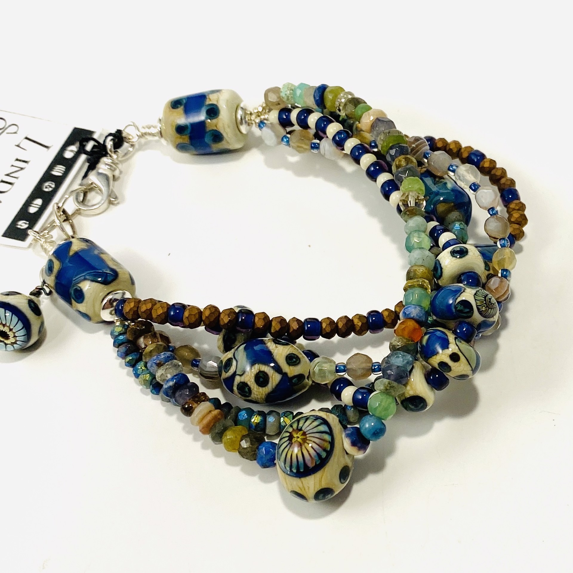 Five Strand Mix Dark Blue and Ivory Glass Beads Gemstone Beads by Linda Sacra