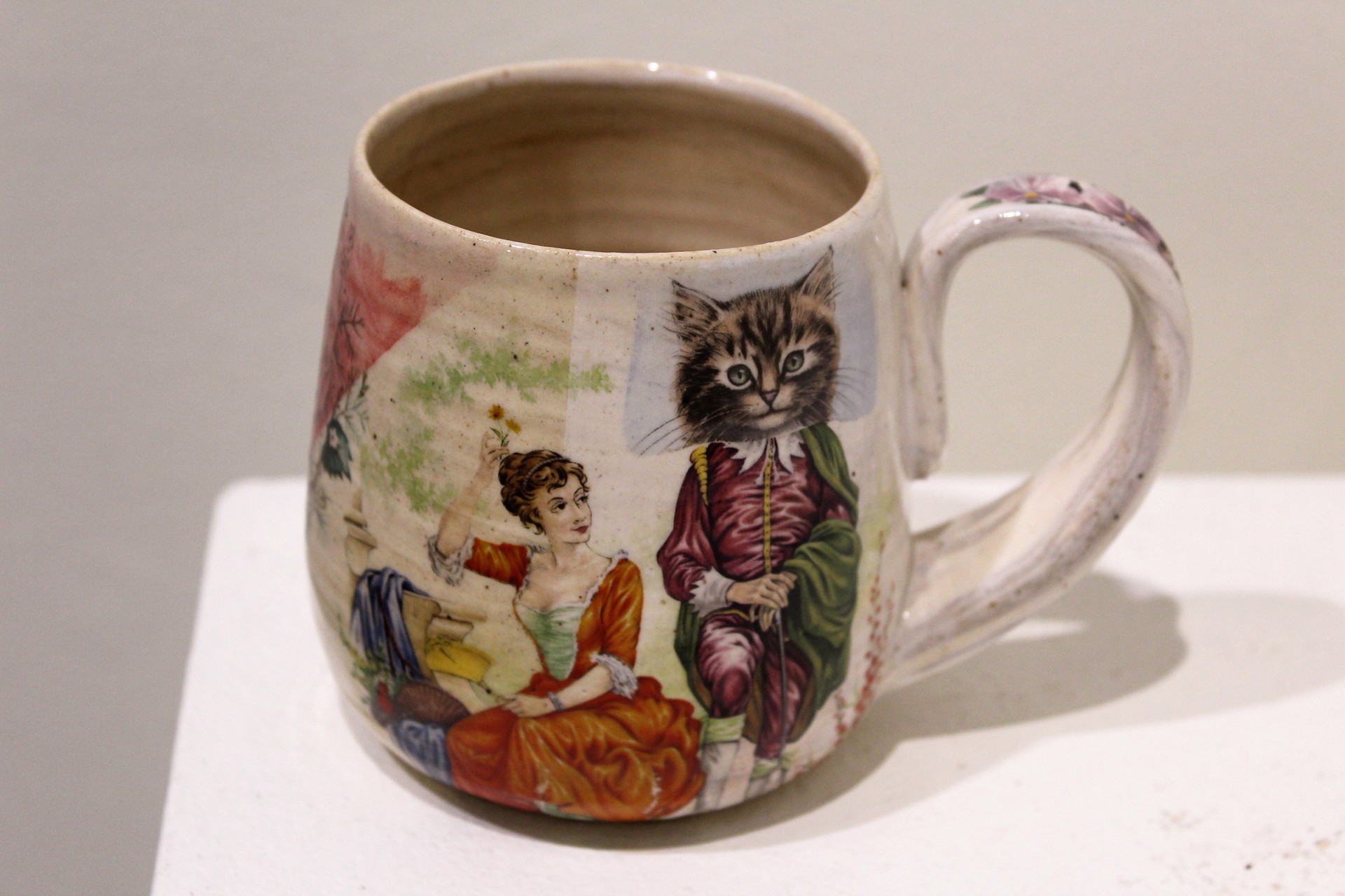 Mug with Cat-Headed Human by Kristen Kinnaley