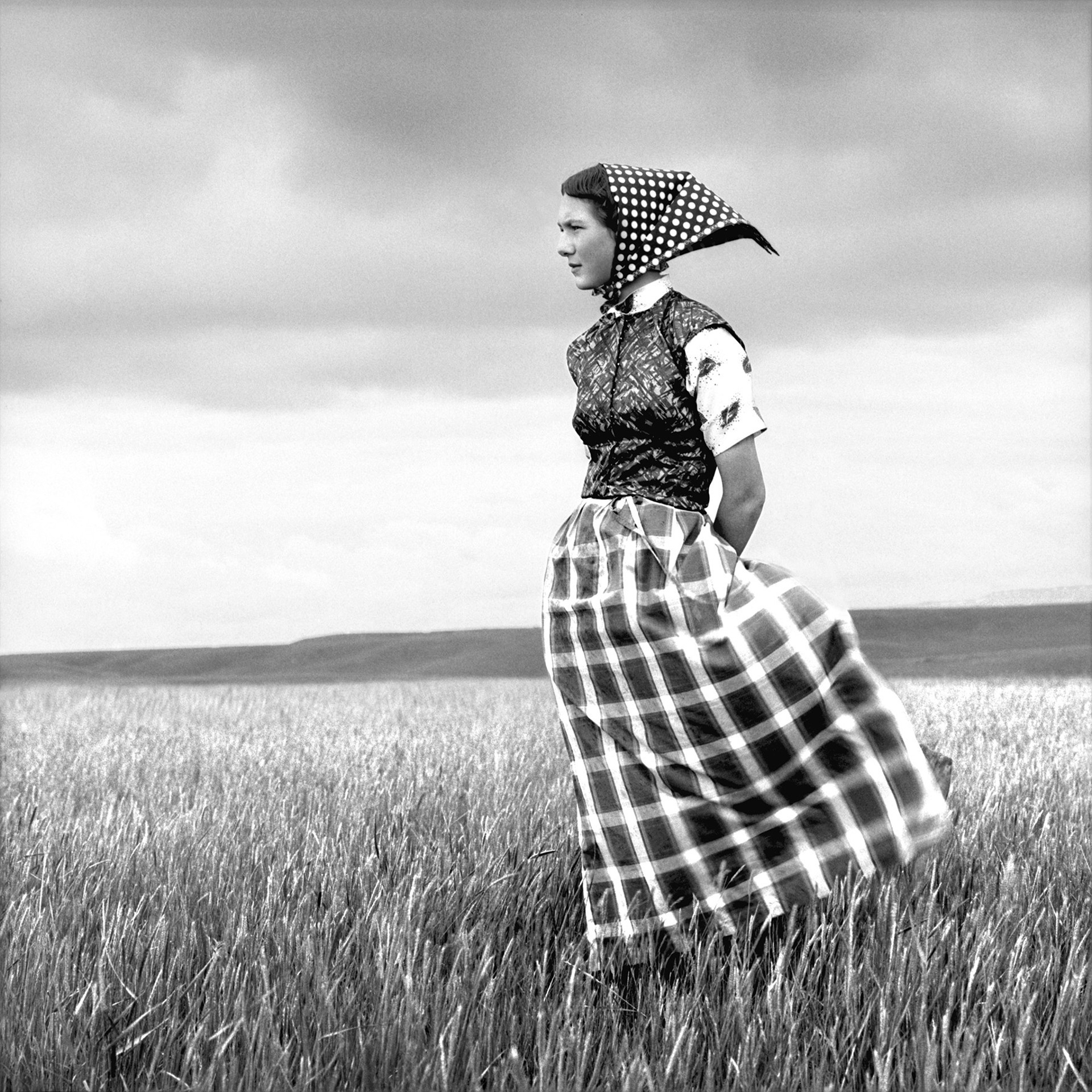 Emma, Hutterite Girl in Field, Duncan Ranch Colony, Harlowton, Montana, June 17, 1994   6/10 by Laura Wilson