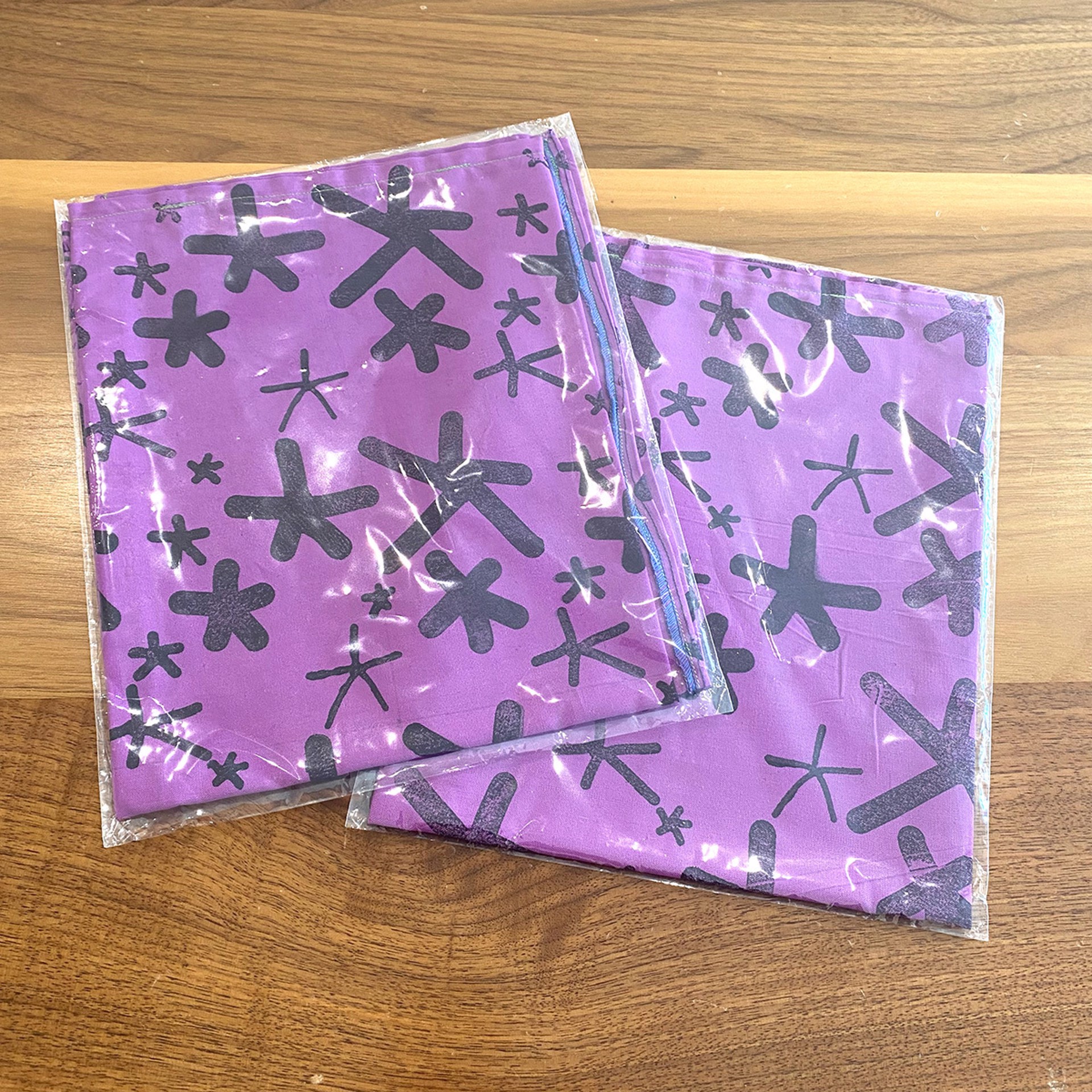 Tea Towel, Deep Purple Cotton with Star Flowers Print by Liz Pead