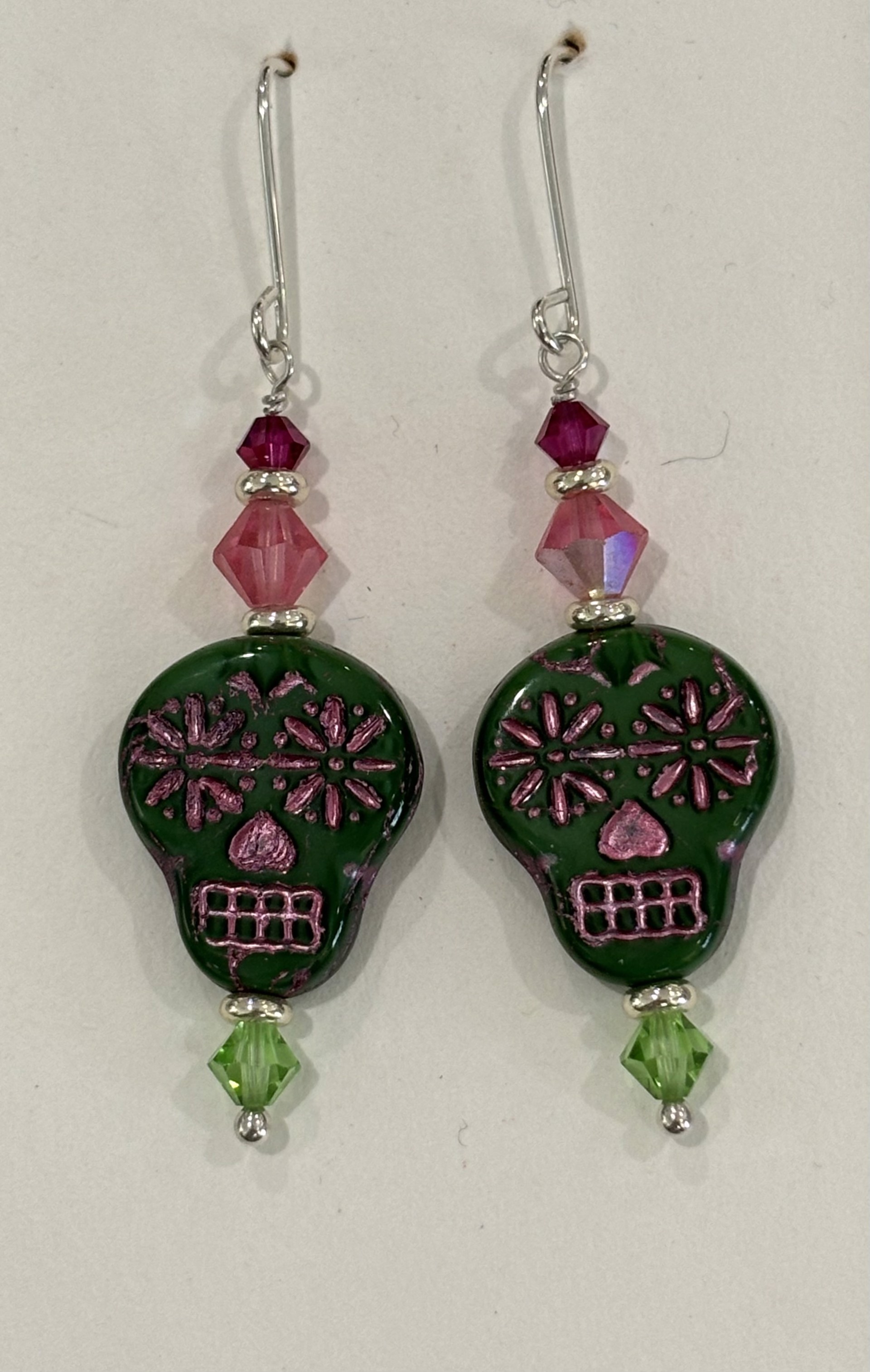 Green and Pink Skull Earrings by Emelie Hebert