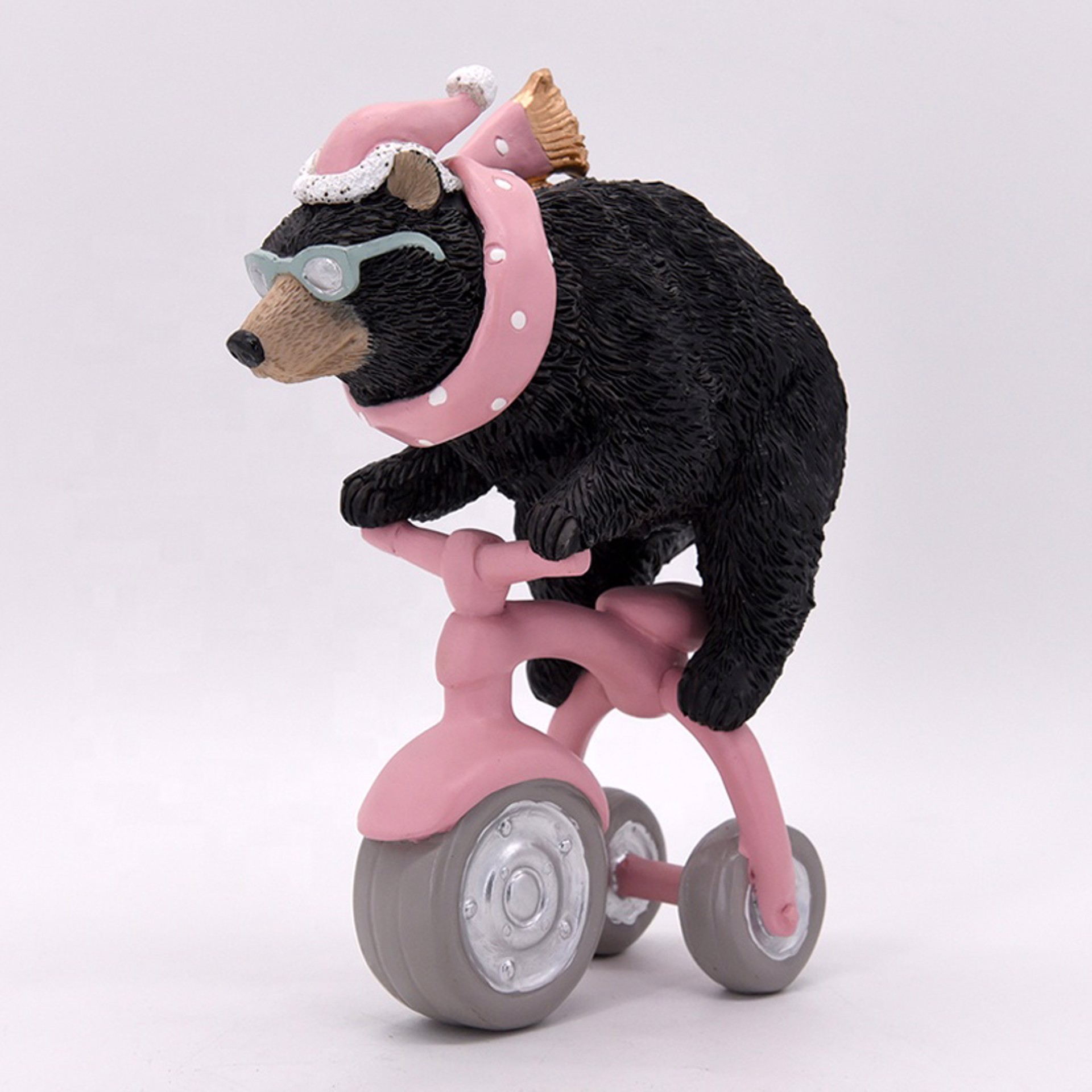 "Bear on the Bicycle" by EBFA Studio