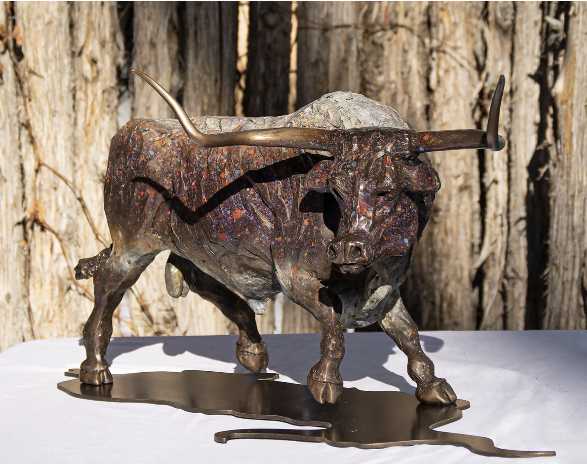 Eye of the Storm ~A little chaos doesn't stop this fierce longhorn. Complete with texture and steel base cut in his shadow, each bronze of this limited edition of 30 has a custom color patina by Barbara by Barbara Meikle