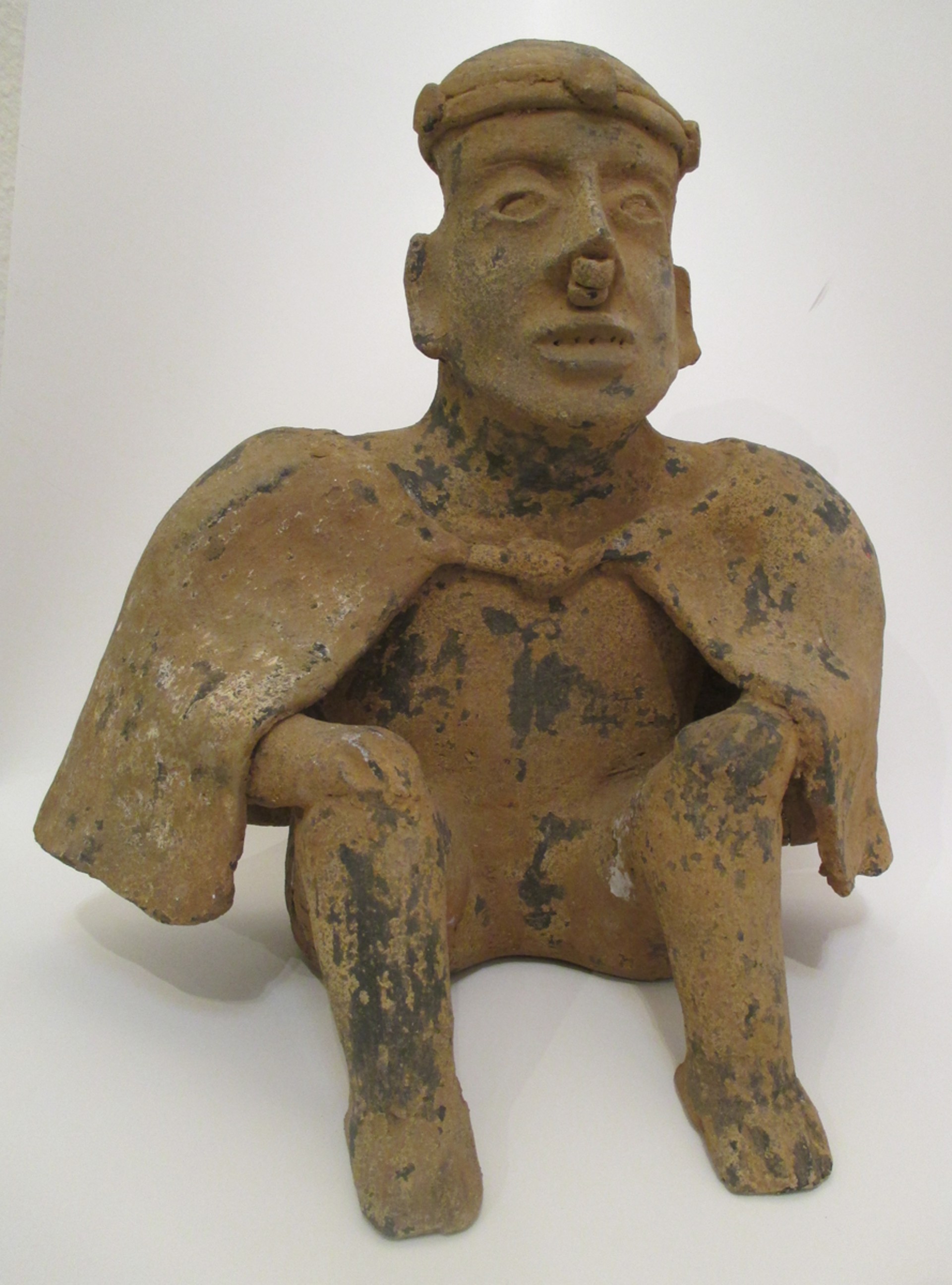 Caped Seated Figure  Nayarit 700 BC-300 AD by Pre Columbian