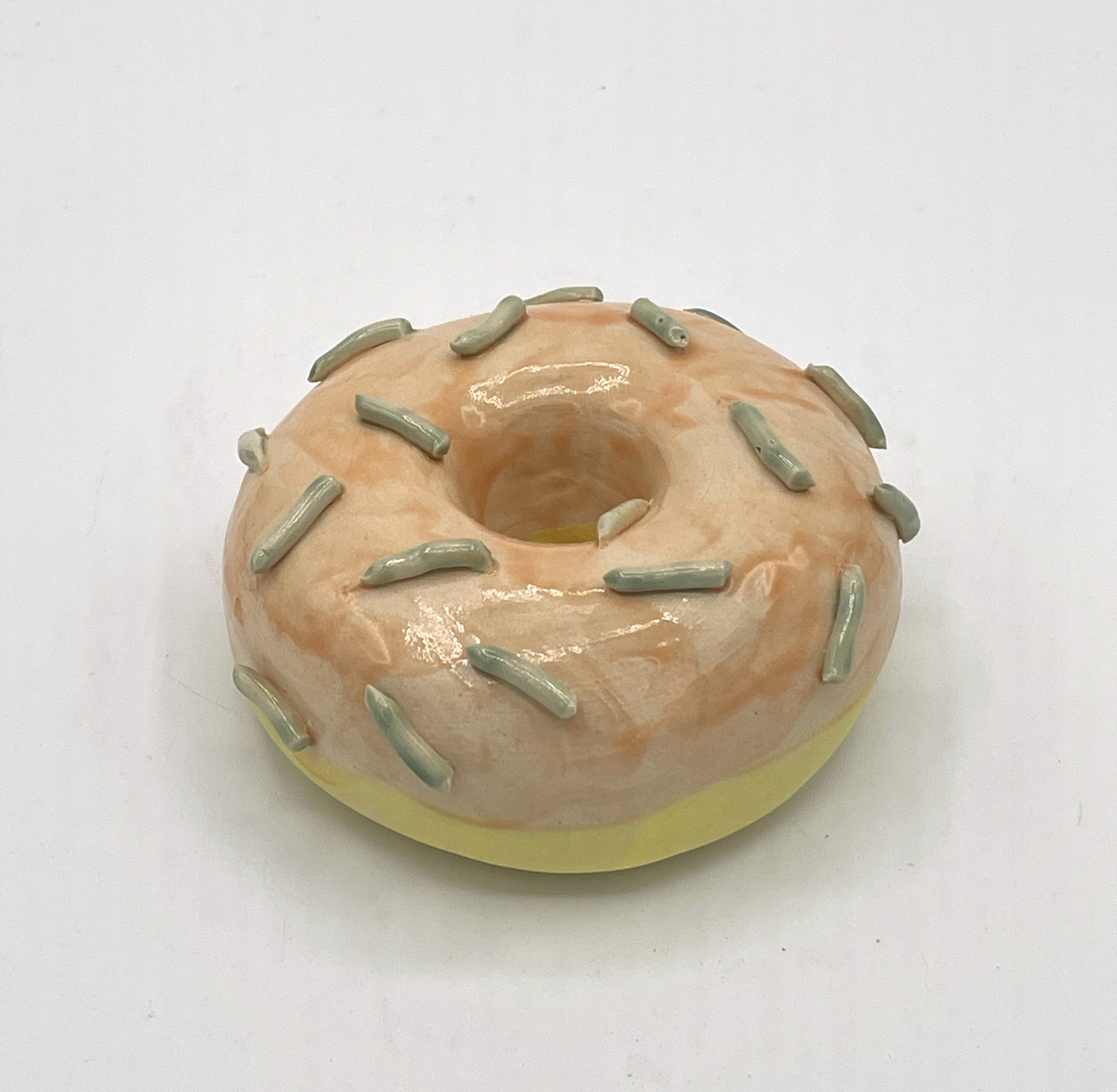 Lemon Donut with Orange Glaze and Sprinkles by Liv Antonecchia