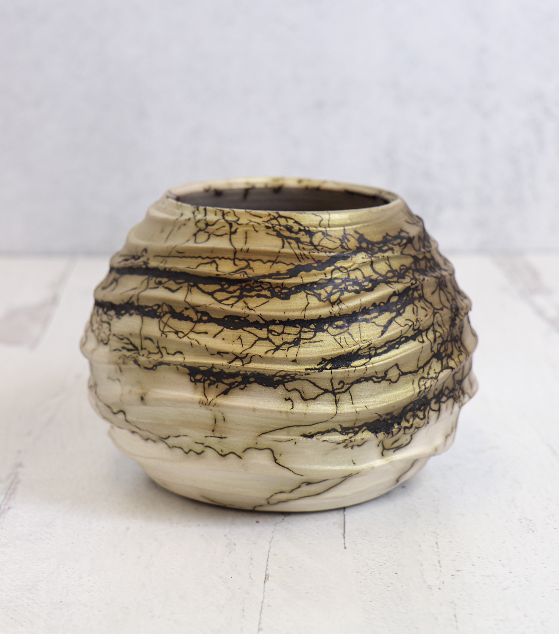 Gold Mica Horsehair Pottery Orb with Wavy Slip by Caroline Renée Woolard