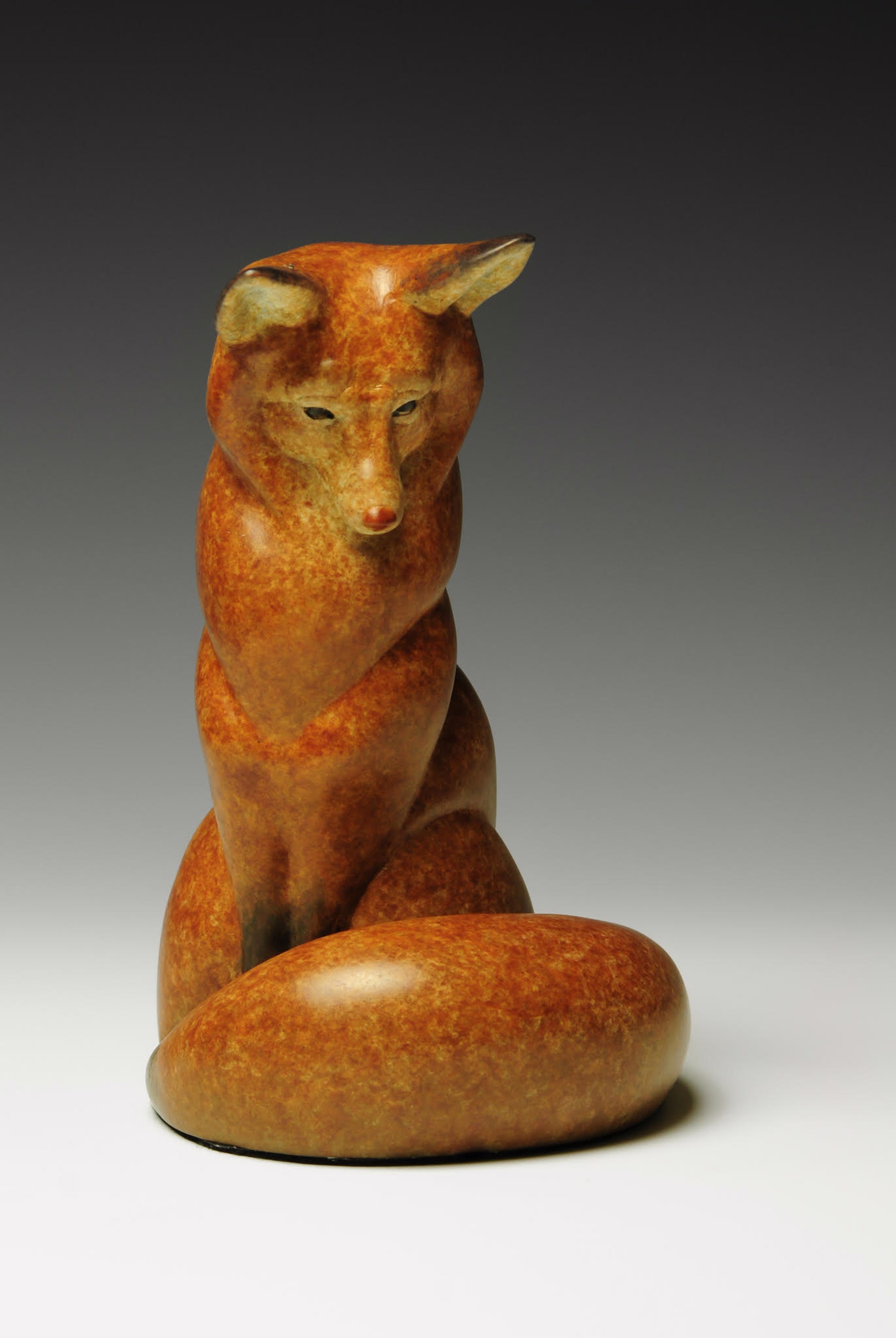 Bronze Sculpture Of A Sitting Fox With Orange Petina