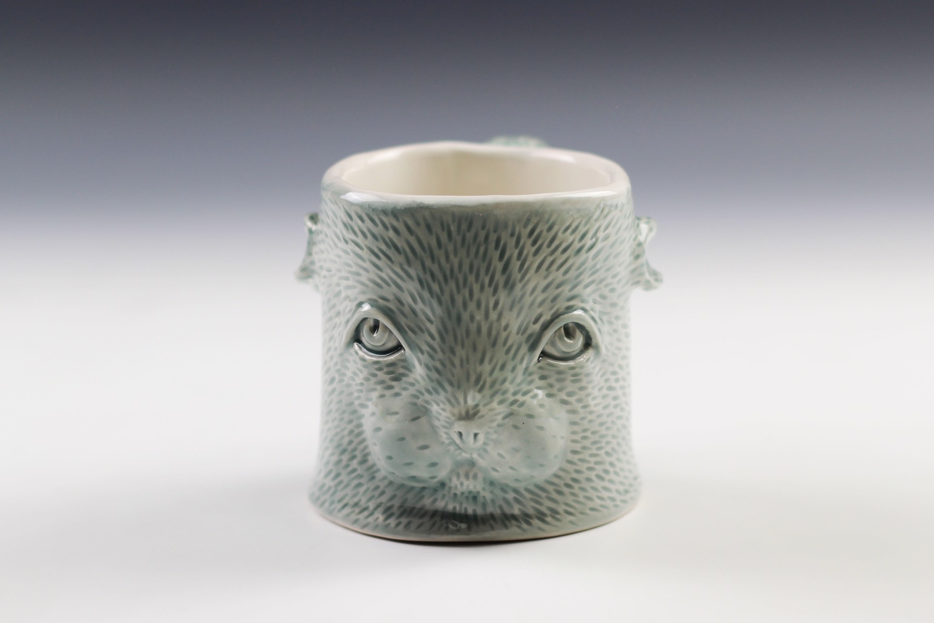 Blue Bunny Mug by Debbie Kupinsky