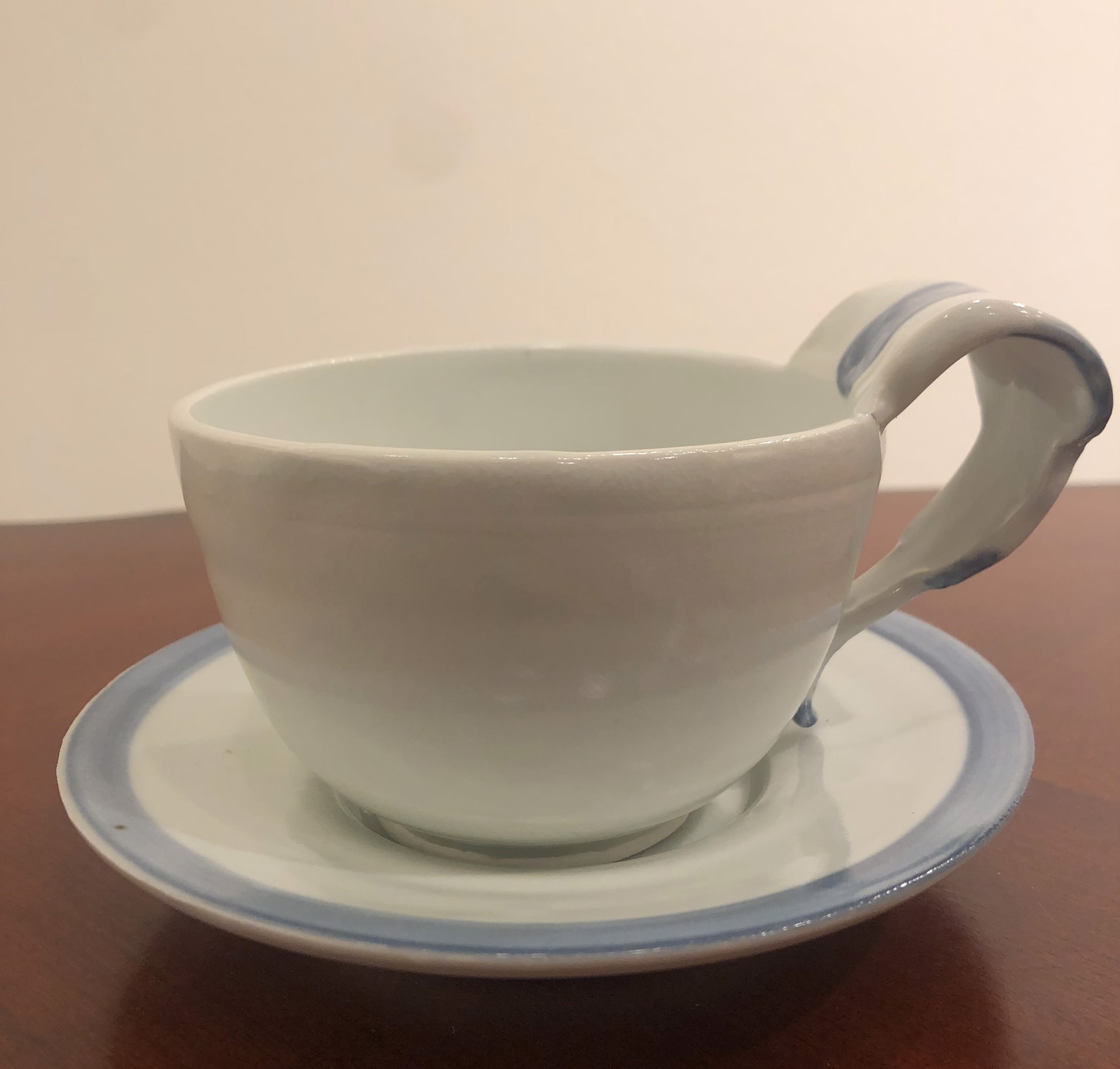 Teacup, porcelain cup and saucer by Monica Plank