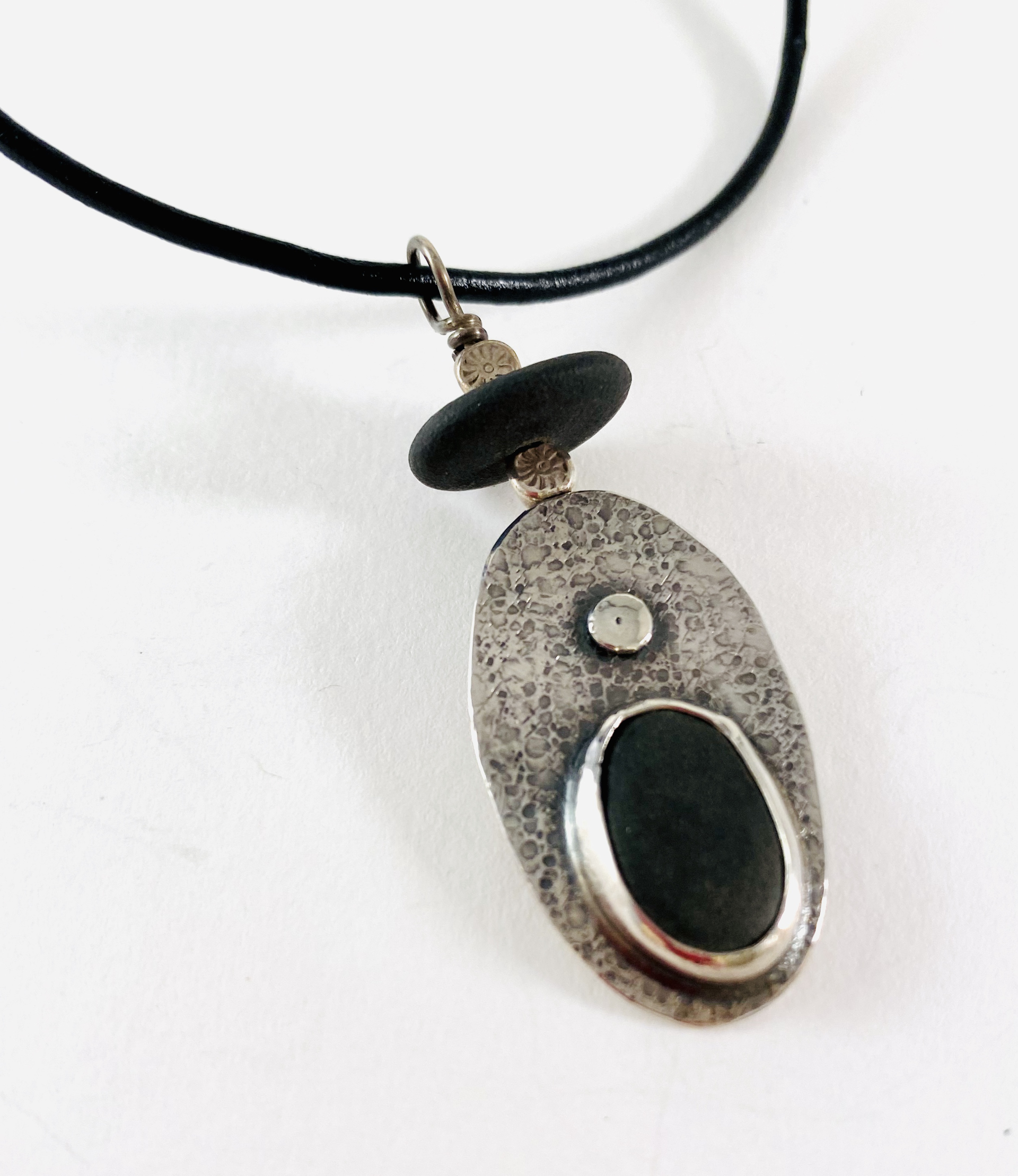 Sterling, Riverstone Pendant on leather by Anne Bivens