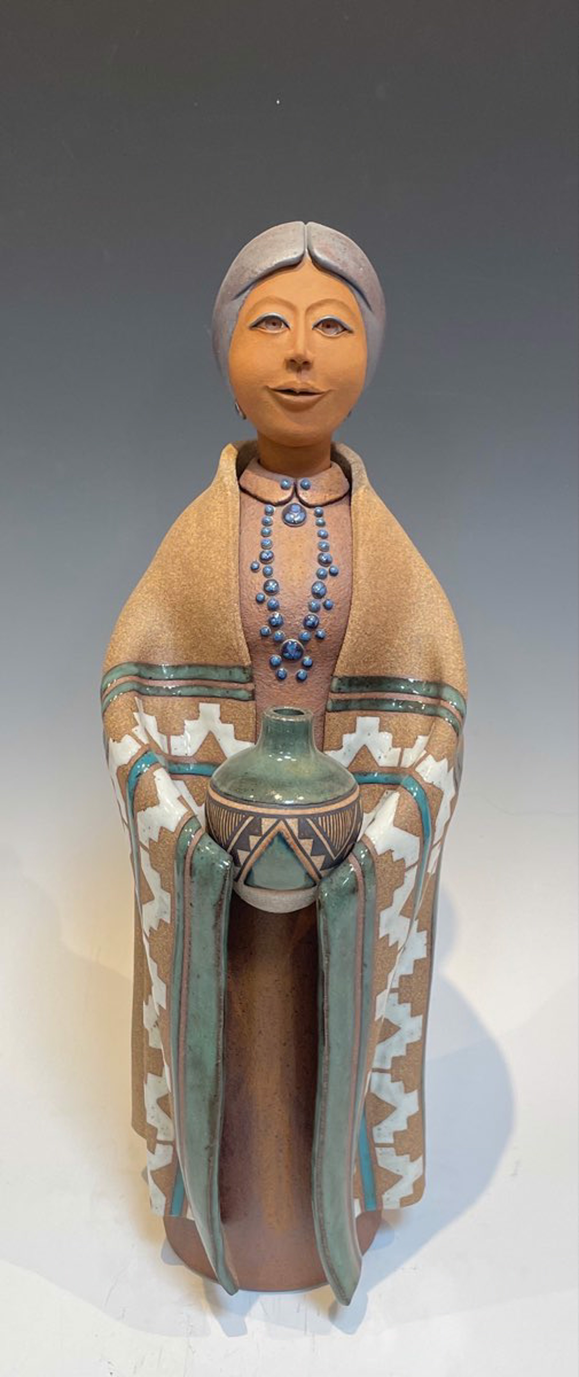 Navajo Woman - Standing with Pot, Green by Terry Slonaker