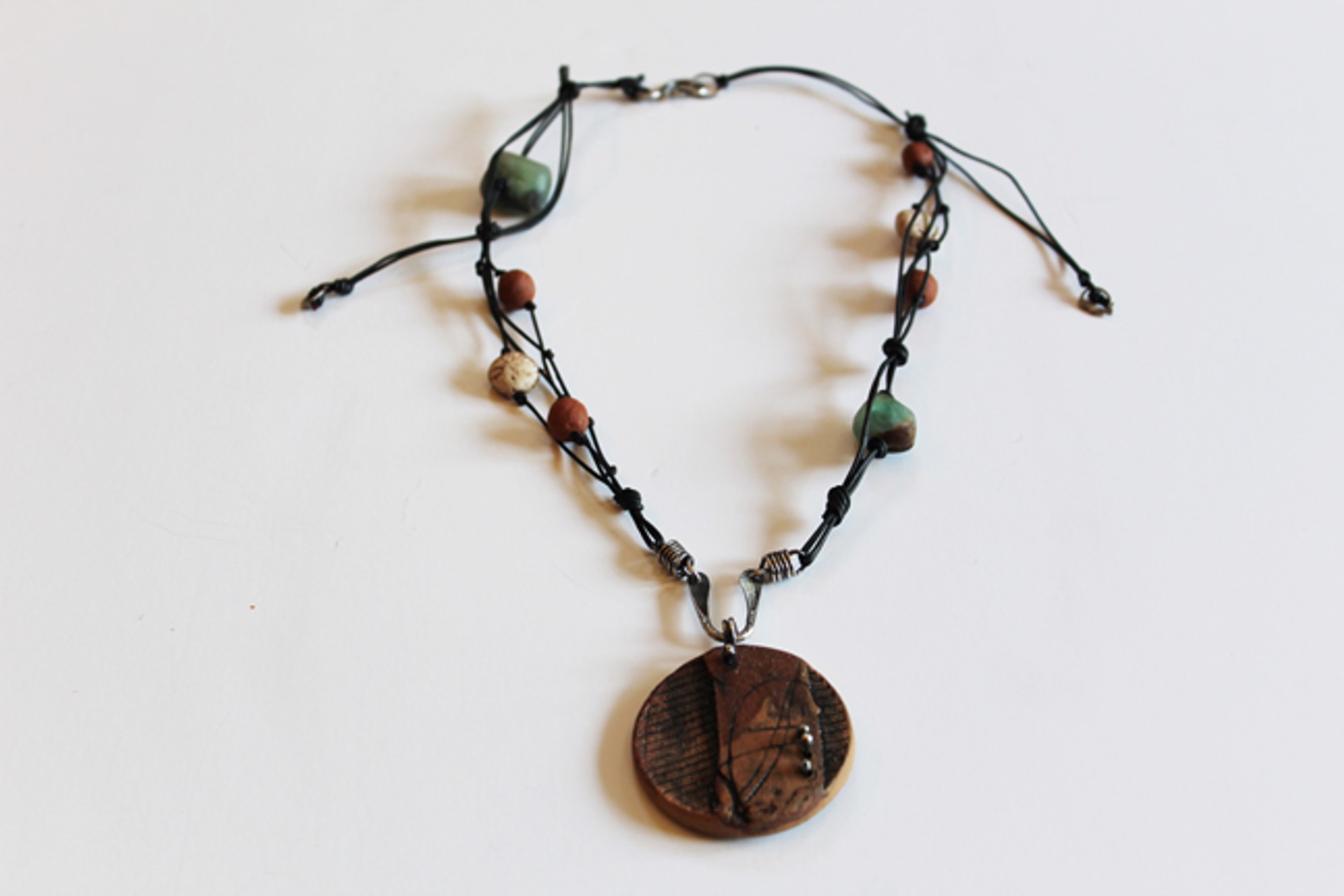 Stone & Clay Beads & Ceramic Pendant on Leather Necklace by Mary Lynn Portera
