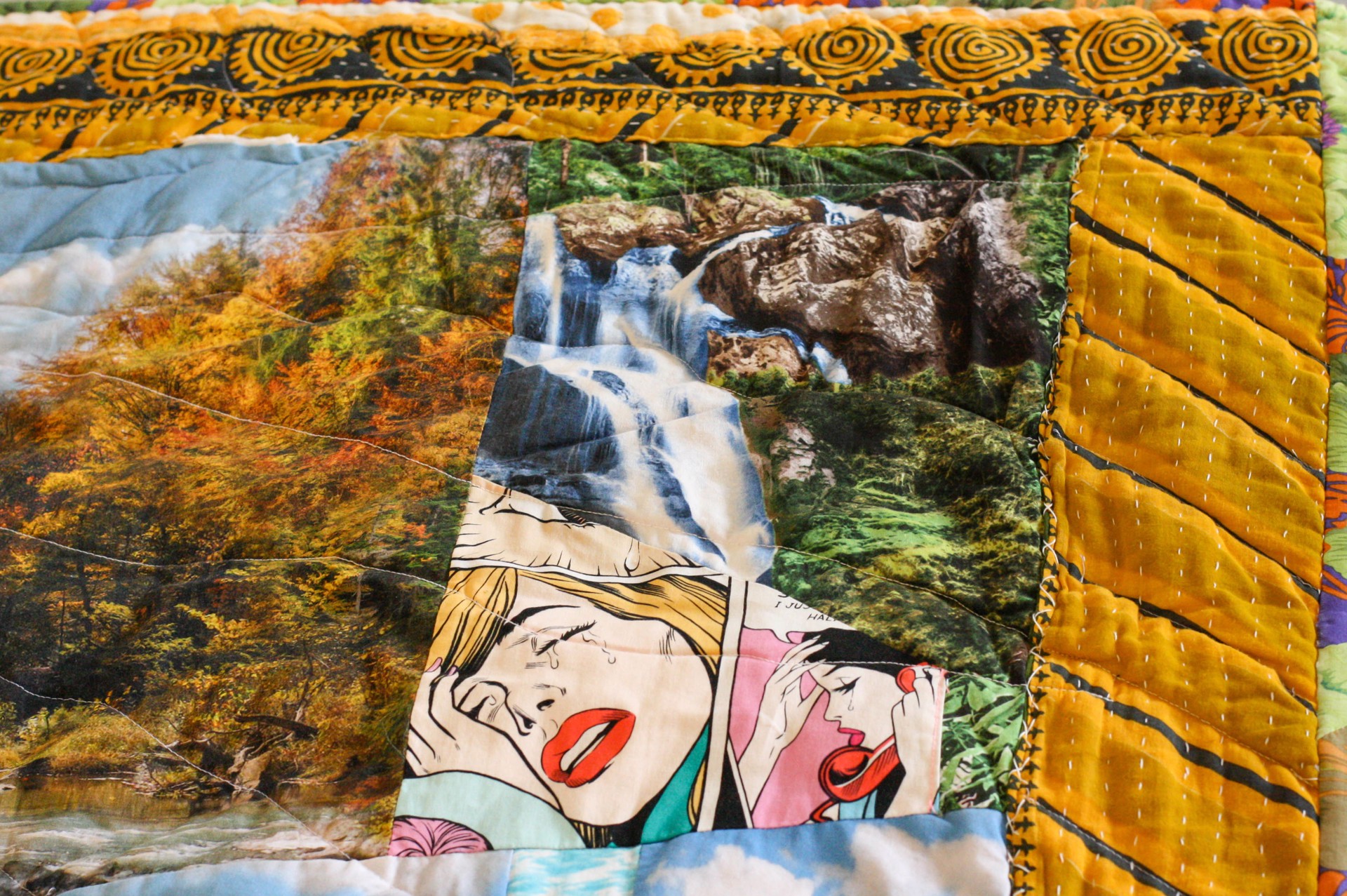 Mary Comforts the Grieving and Dying with a Mini Quilt by Lauren Gregory