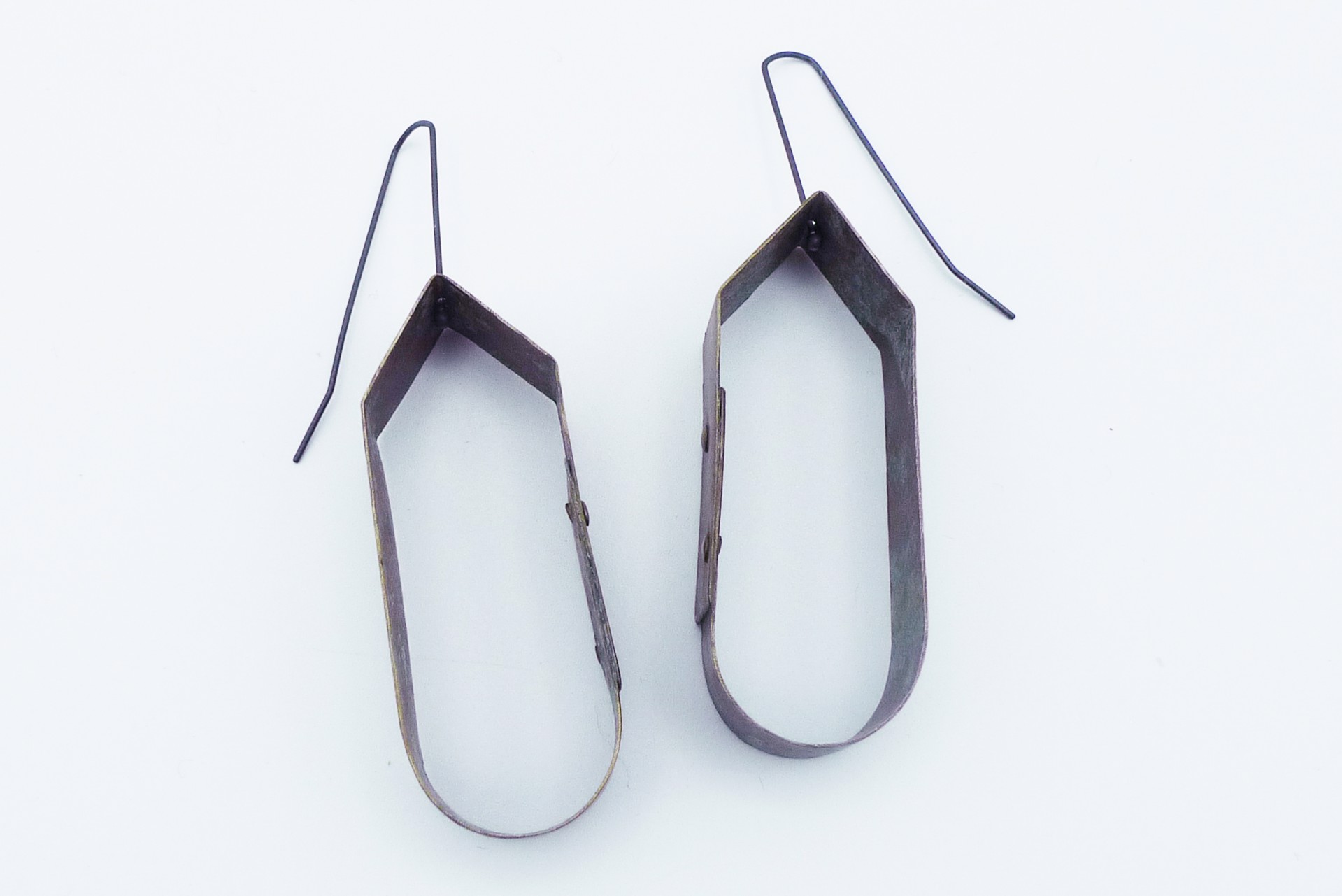 Riveted Frame Earrings by Juan Fried