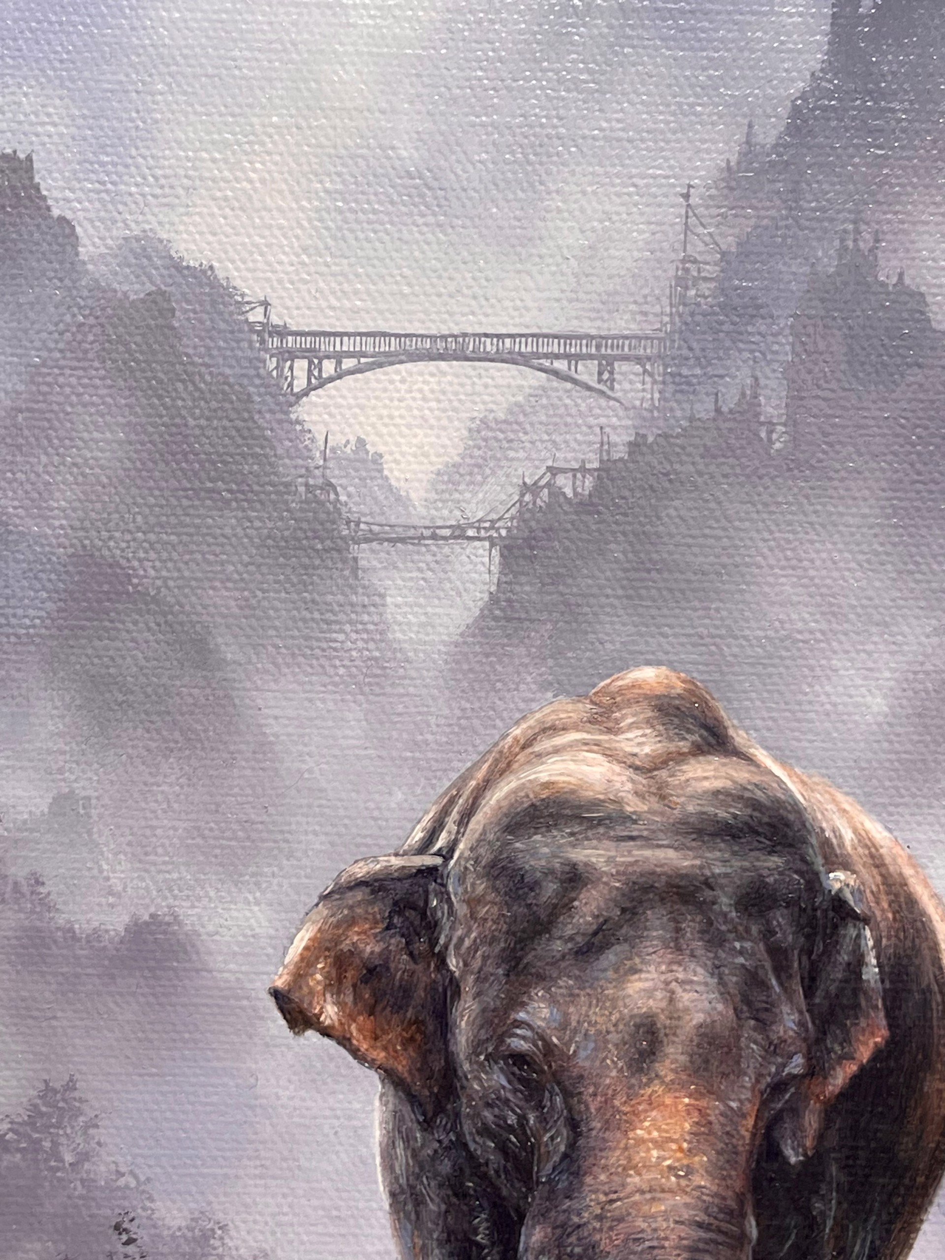 Asian Elephant Standing Before Hazy Blue Mountains by Brian Mashburn