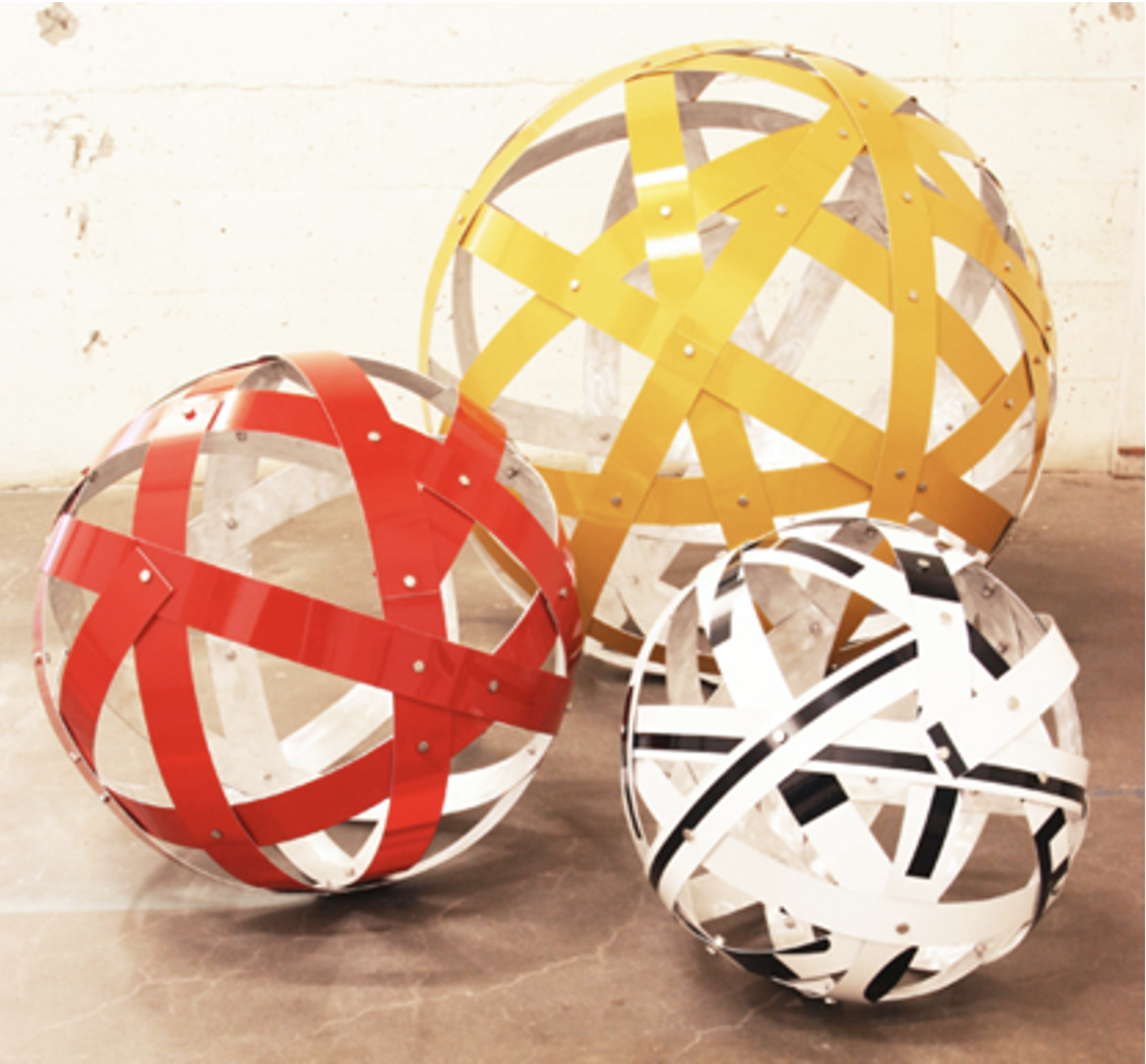 Gateway: four 24" hanging spheres, 3/16" thick by Linda Raynsford
