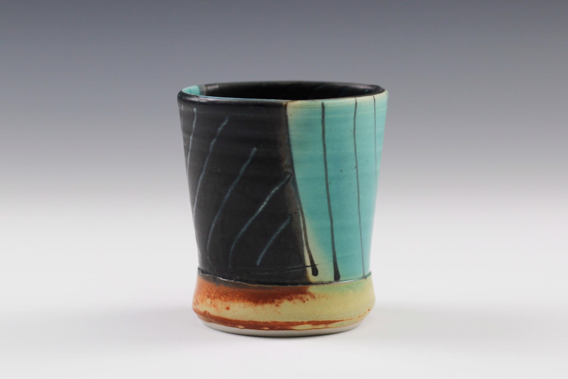 Cup by Delores Fortuna