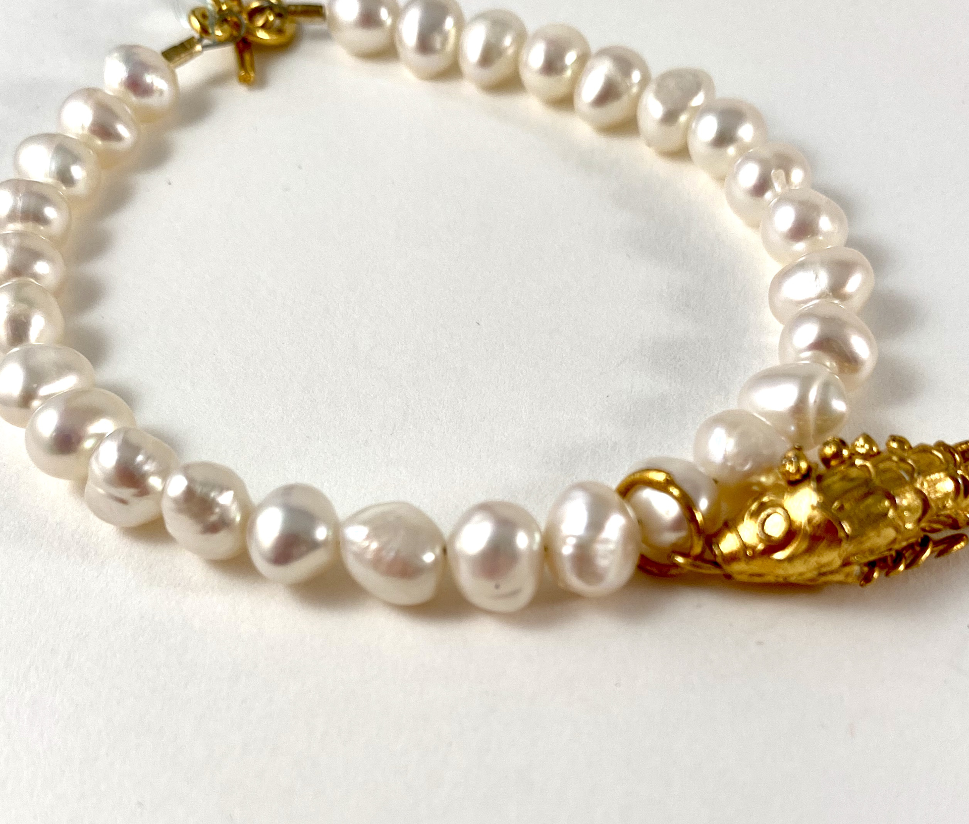 White Pearl Bracelet, brass fish charm and clasp P18 by Nance Trueworthy