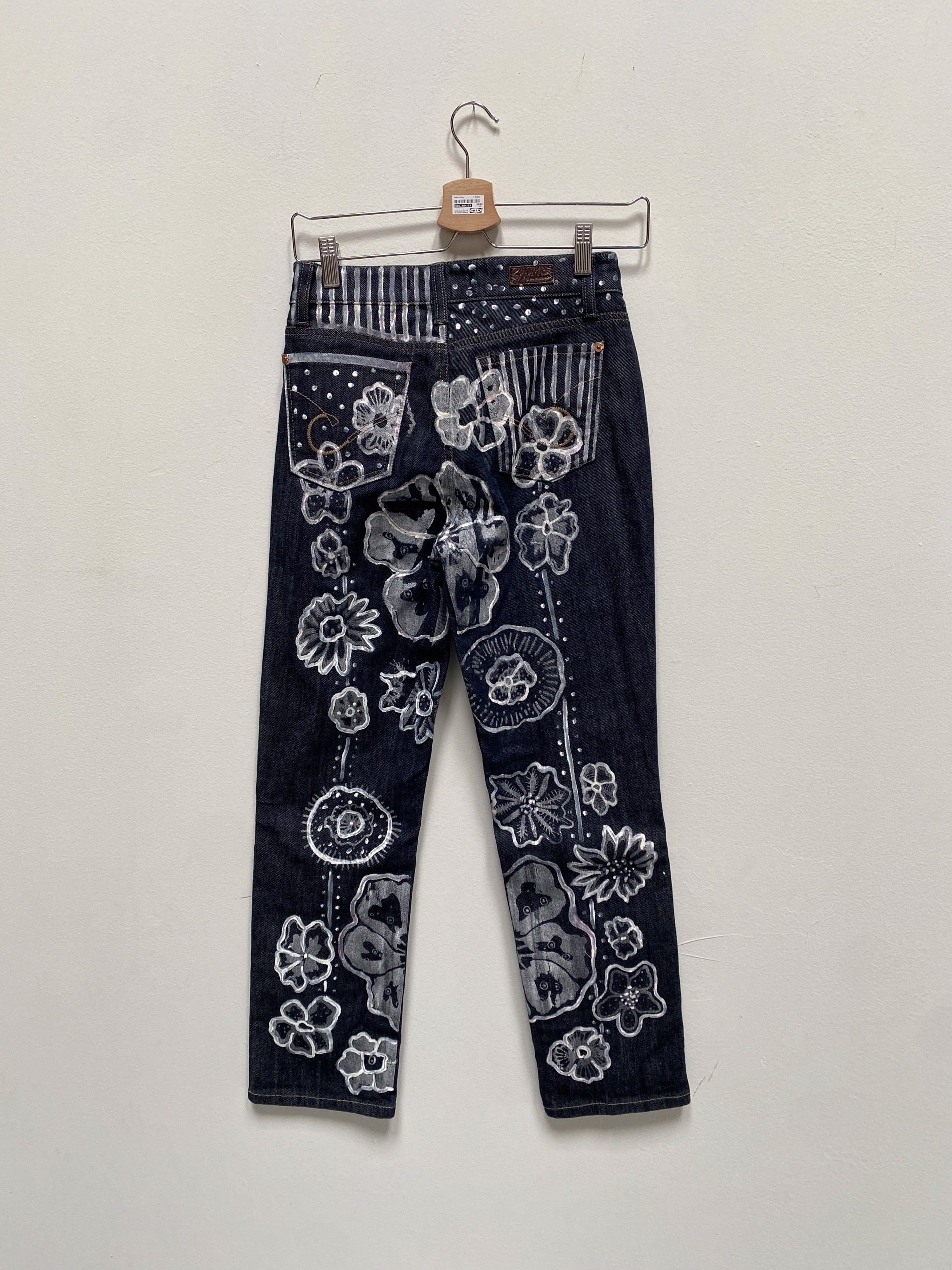 Silver Flowers on Navy Jeans by Laurie Shapiro