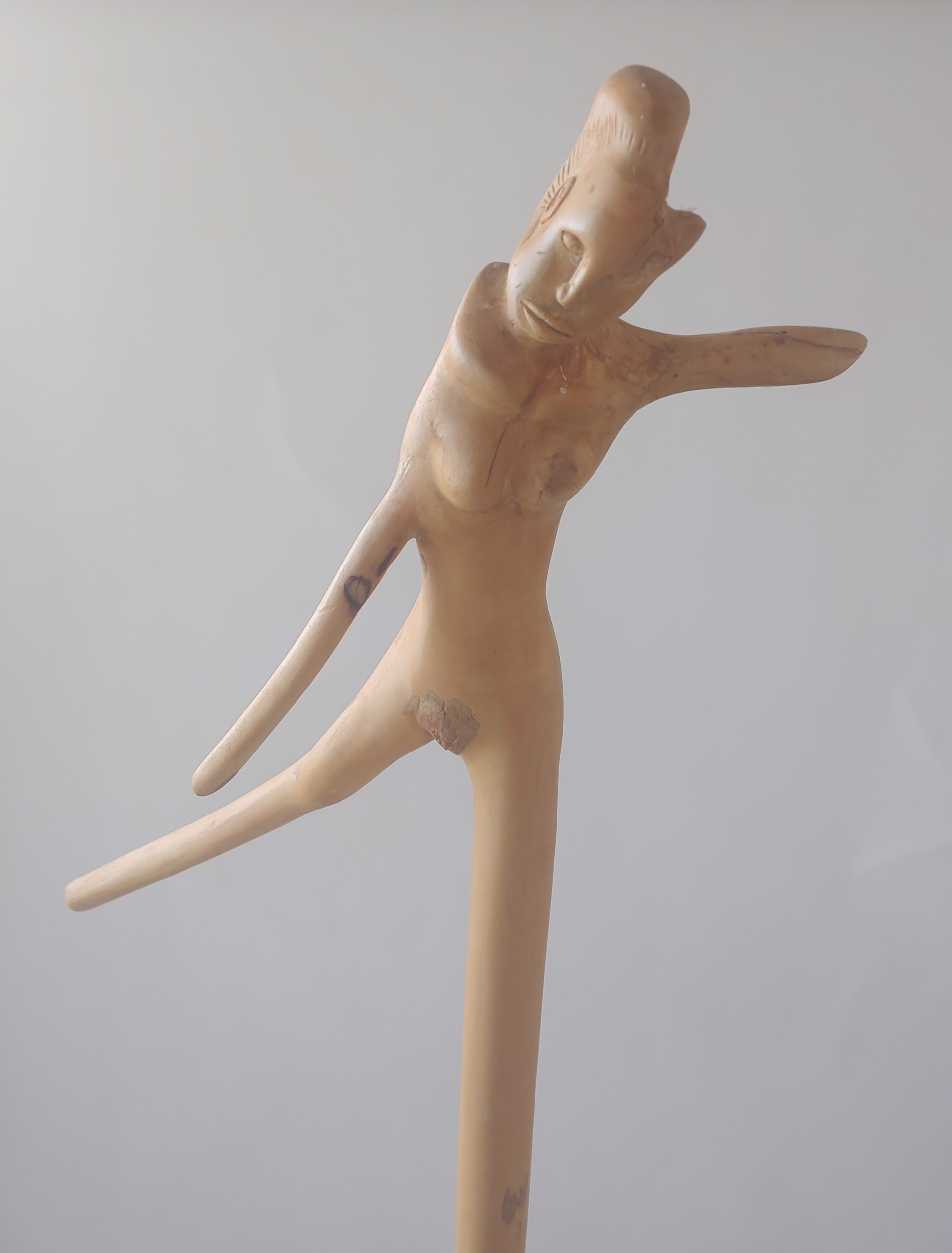 Anjelique Walking Stick on Rolling Base - Wood Sculpture by David Amdur