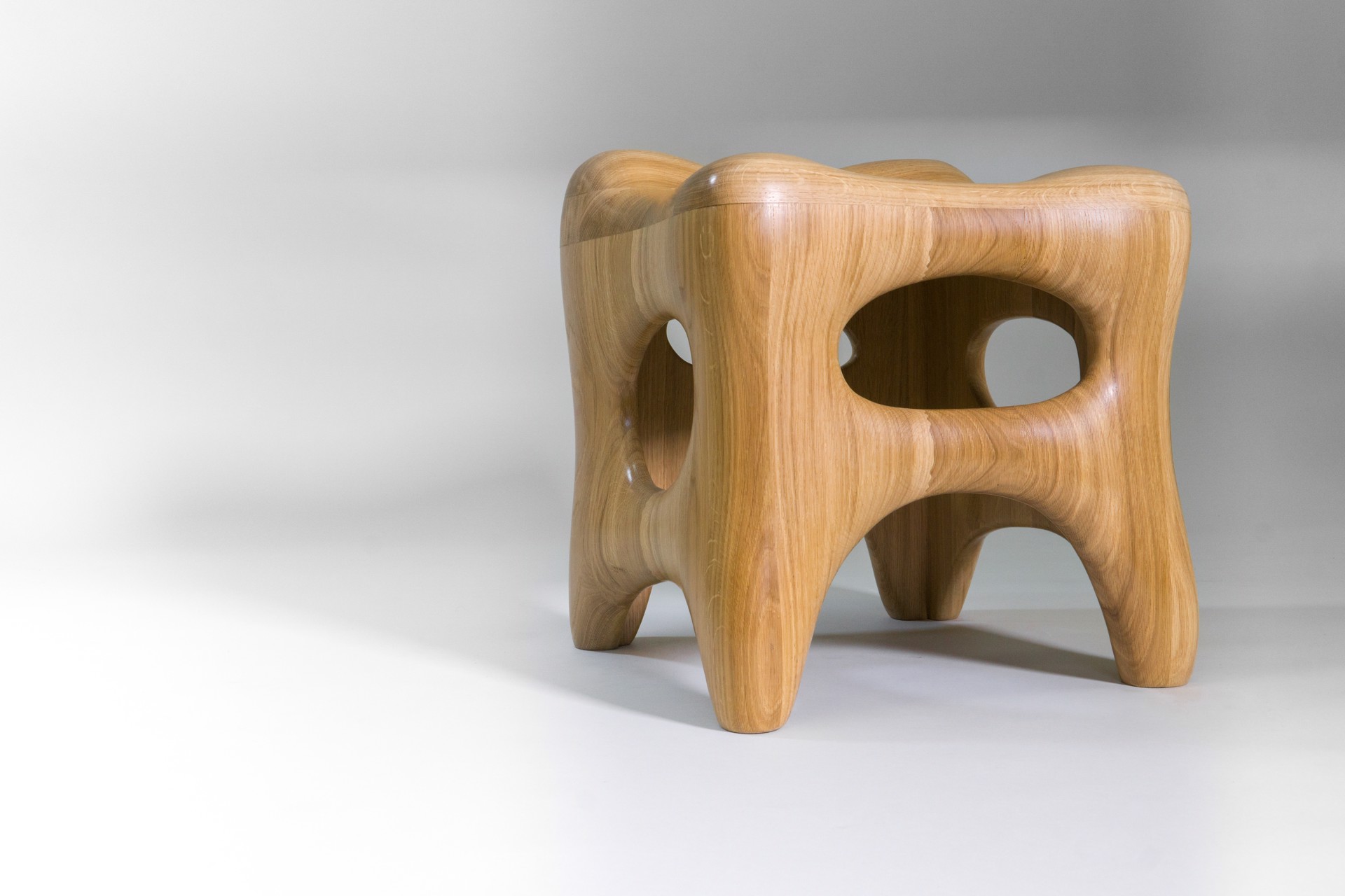 "Osselet" Oak stool by Jacques Jarrige