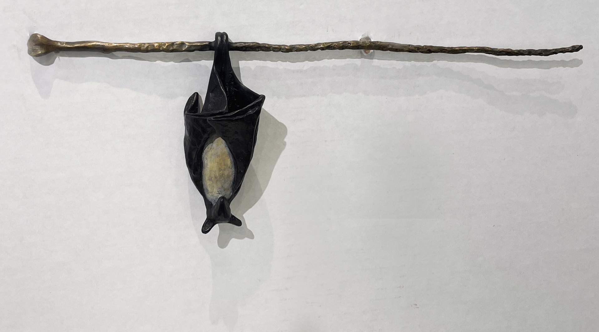 1 Temple Bat on a Branch, hangs from the left by Copper Tritscheller