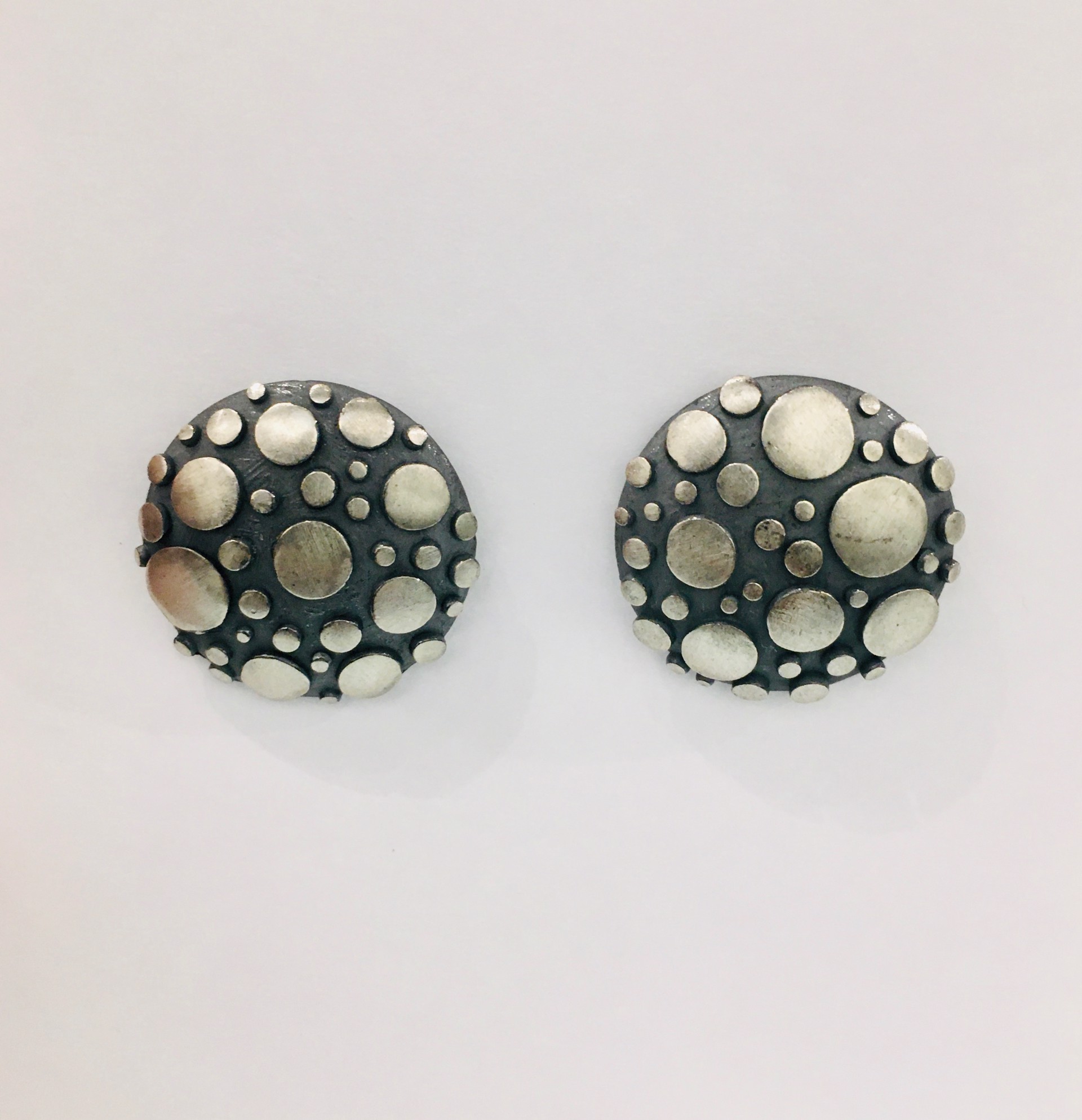Oxidized Silver Round Earrings by DAHLIA KANNER