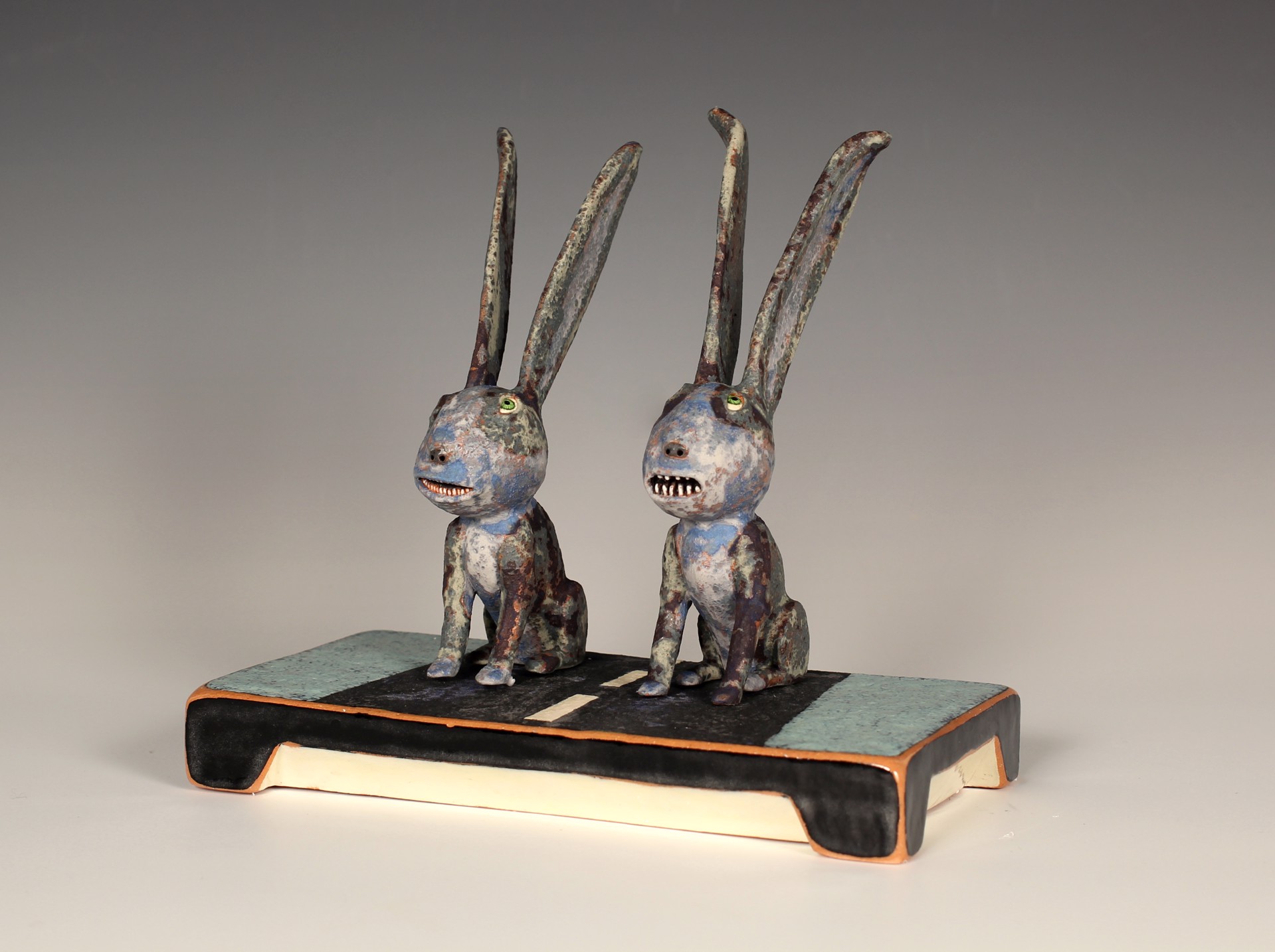 Blue Rabbits on the Road by Wesley Anderegg