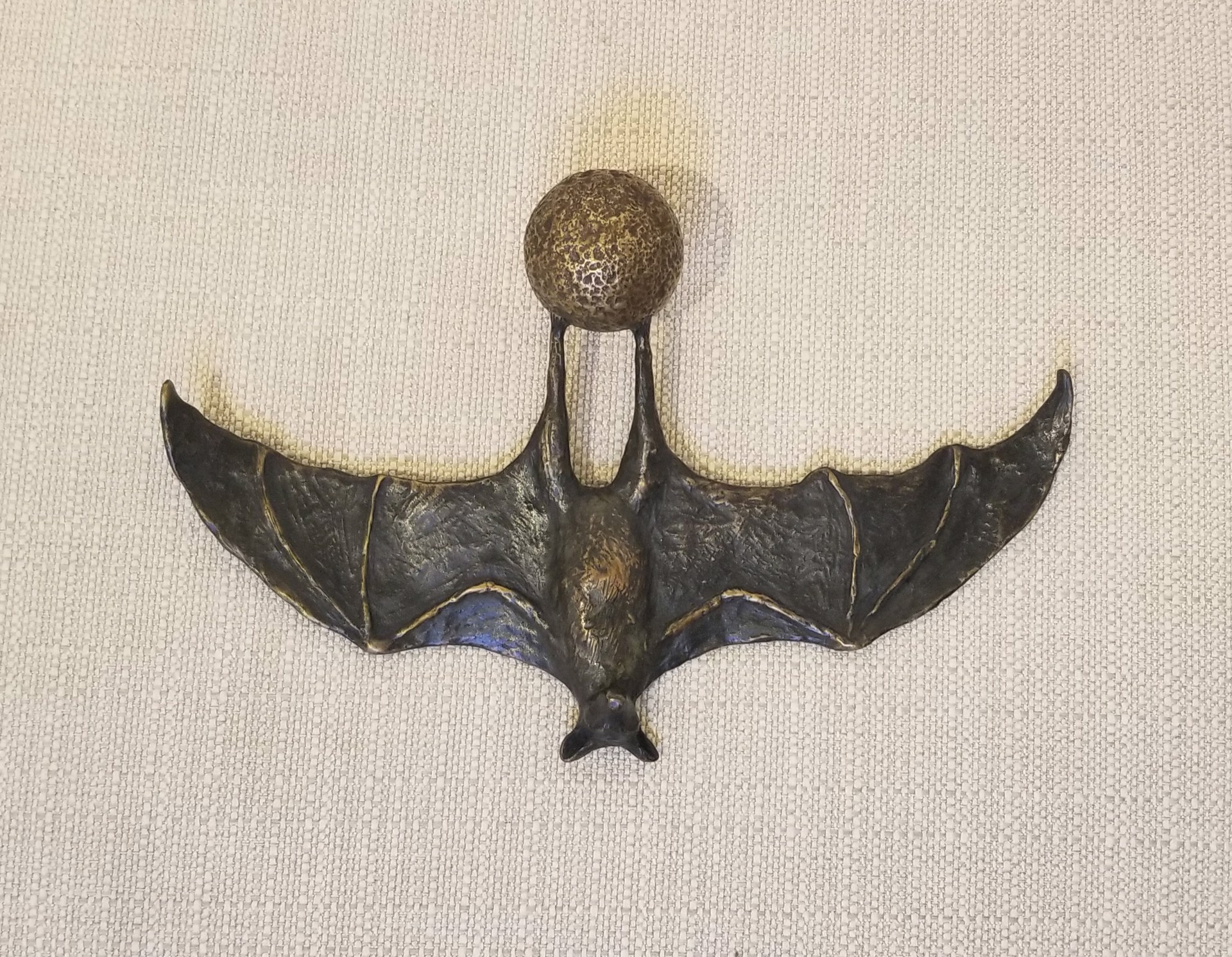 Bat on Ball, brown by Copper Tritscheller