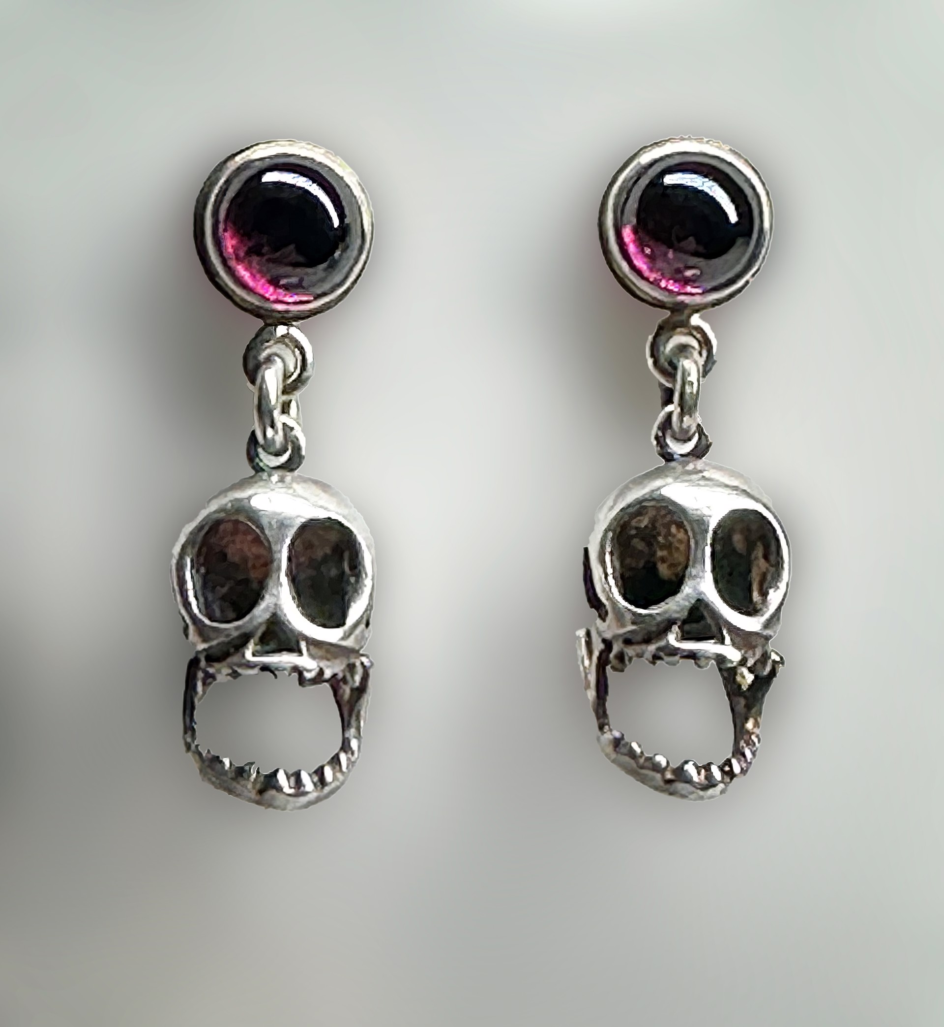 Sterling Silver Earrings, Articulated Skulls by Tabor Porter