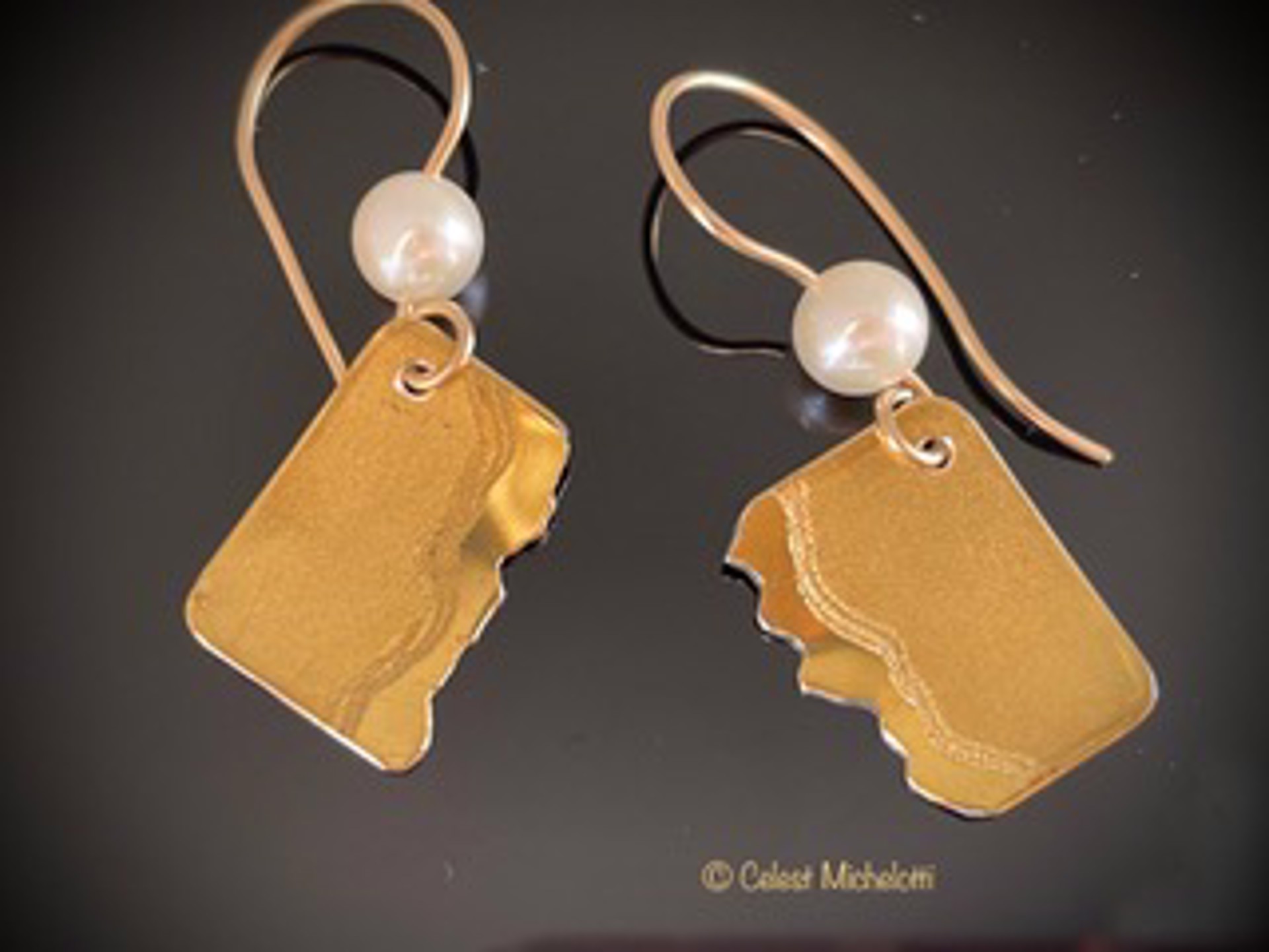 Distant Planets earrings with white pearls by Celest Michelotti