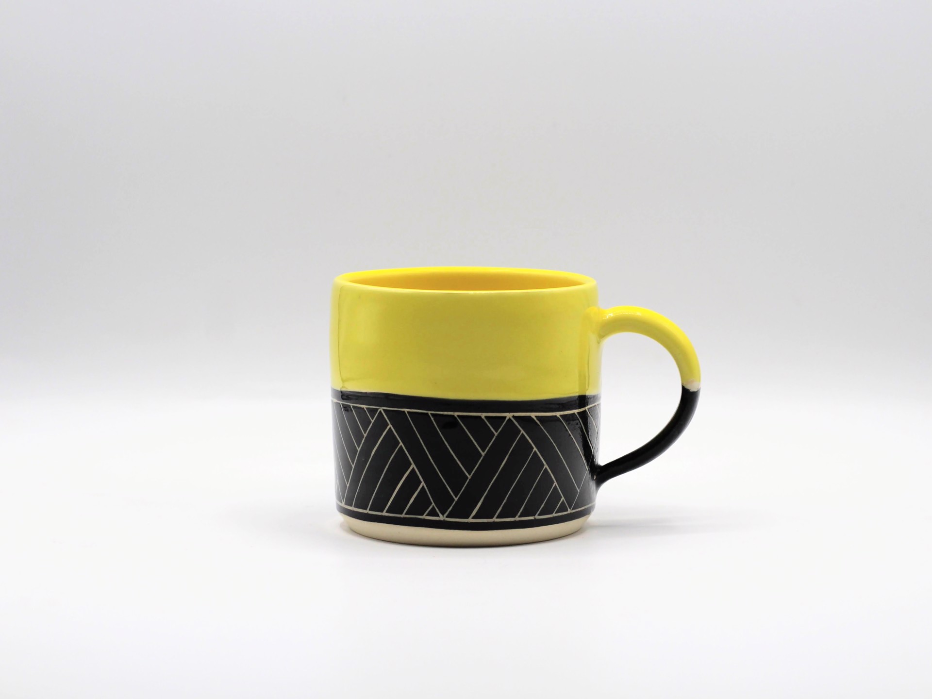 B&W Geometric w/ Yellow Glaze Mug by Kara Lovell