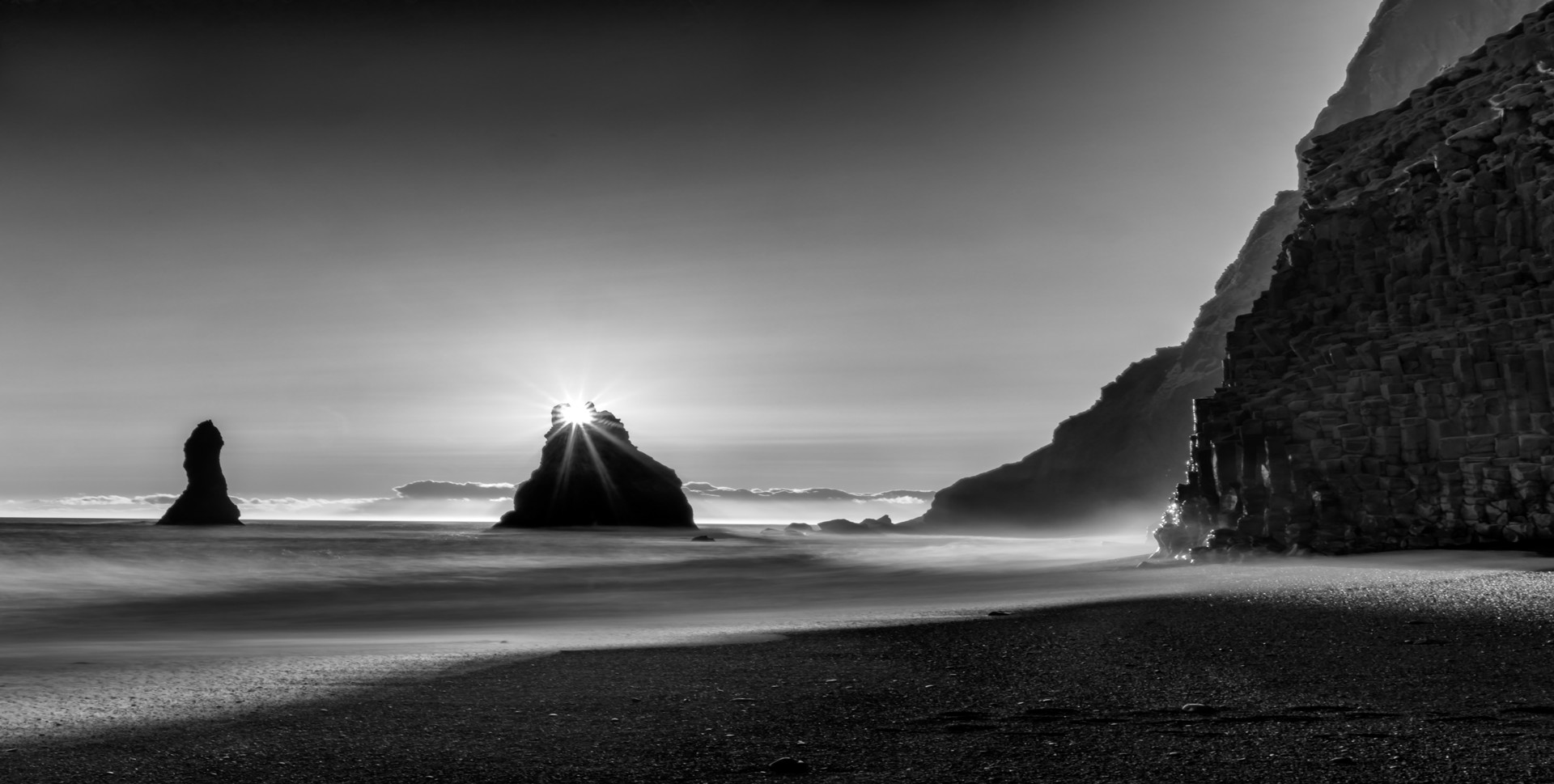 Black Beach Sunrise by Arnold Abelman