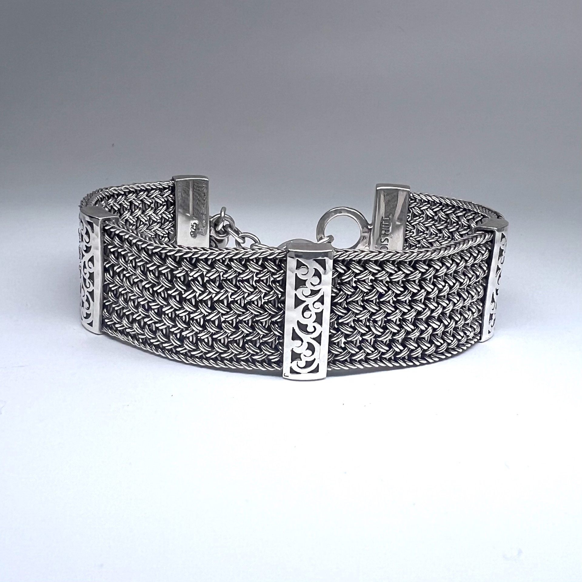 1208 Intricate Hand Carved Woven Bracelet by Lois Hill