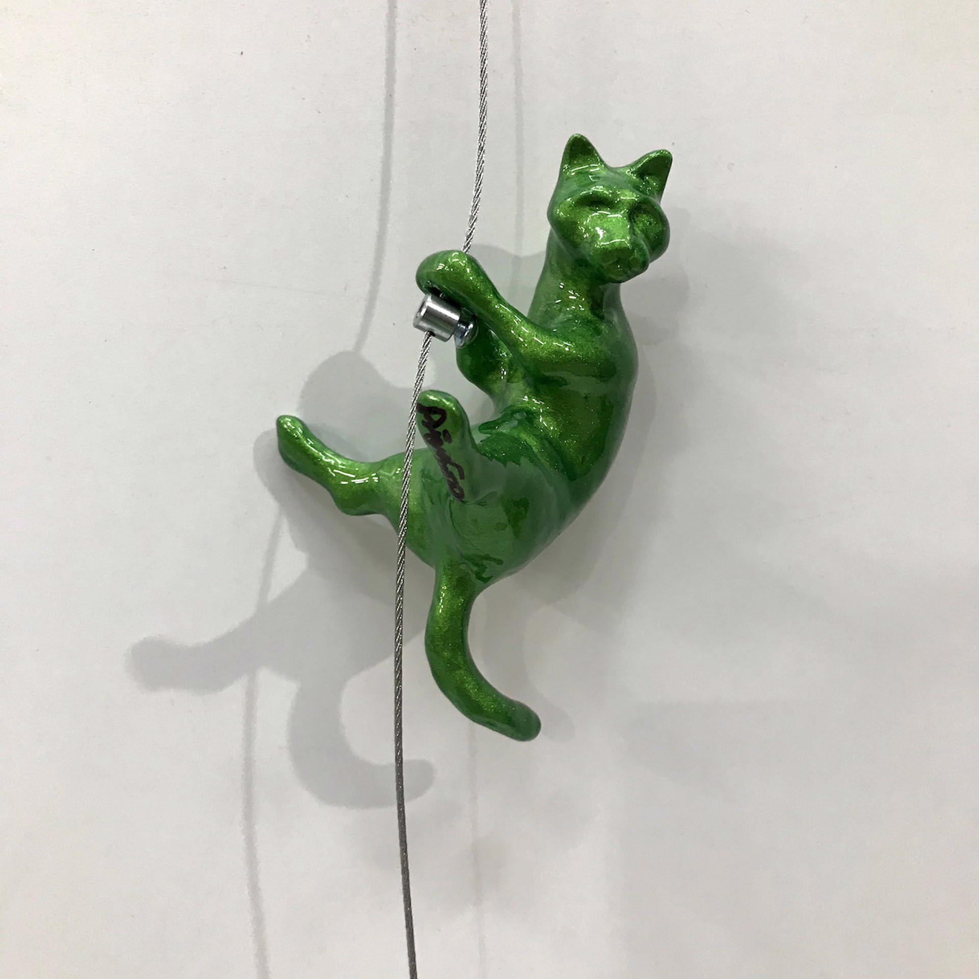 Hanging Cat (Green) by Ancizar Marin