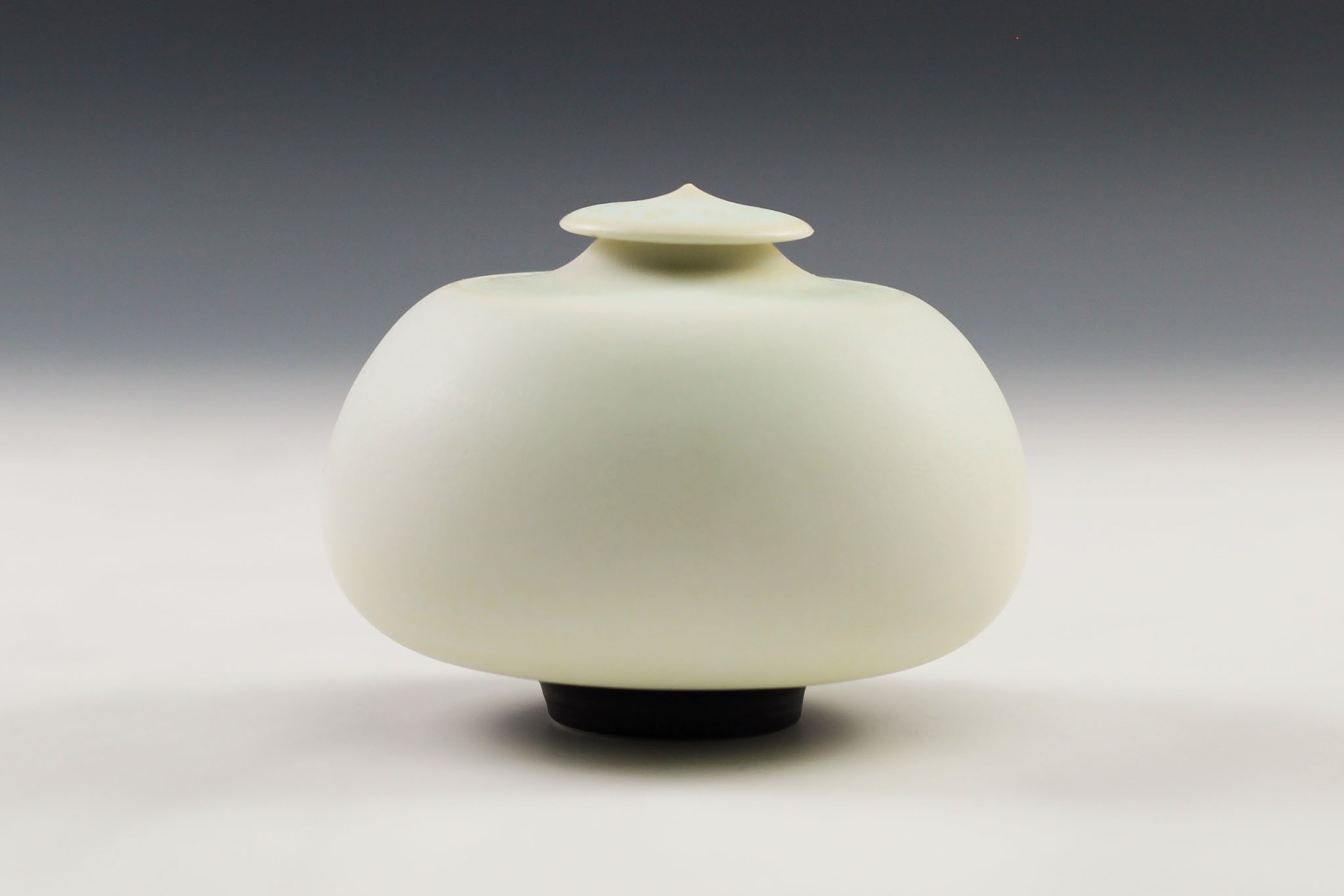 Small White Jar by Charlie Olson