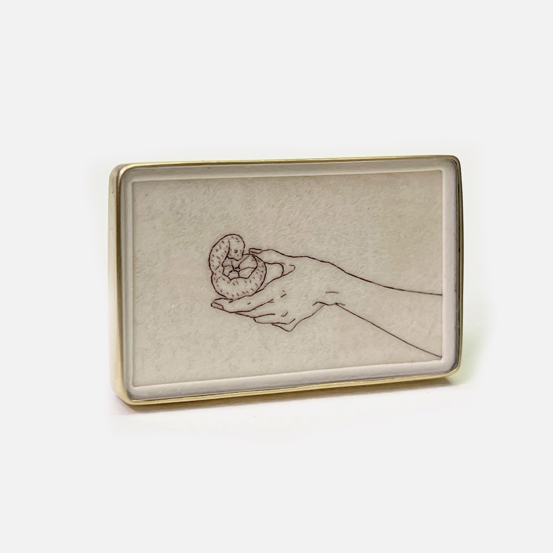 I can peel it for you (hand with clementine) Brooch, 2023 by Melanie Bilenker